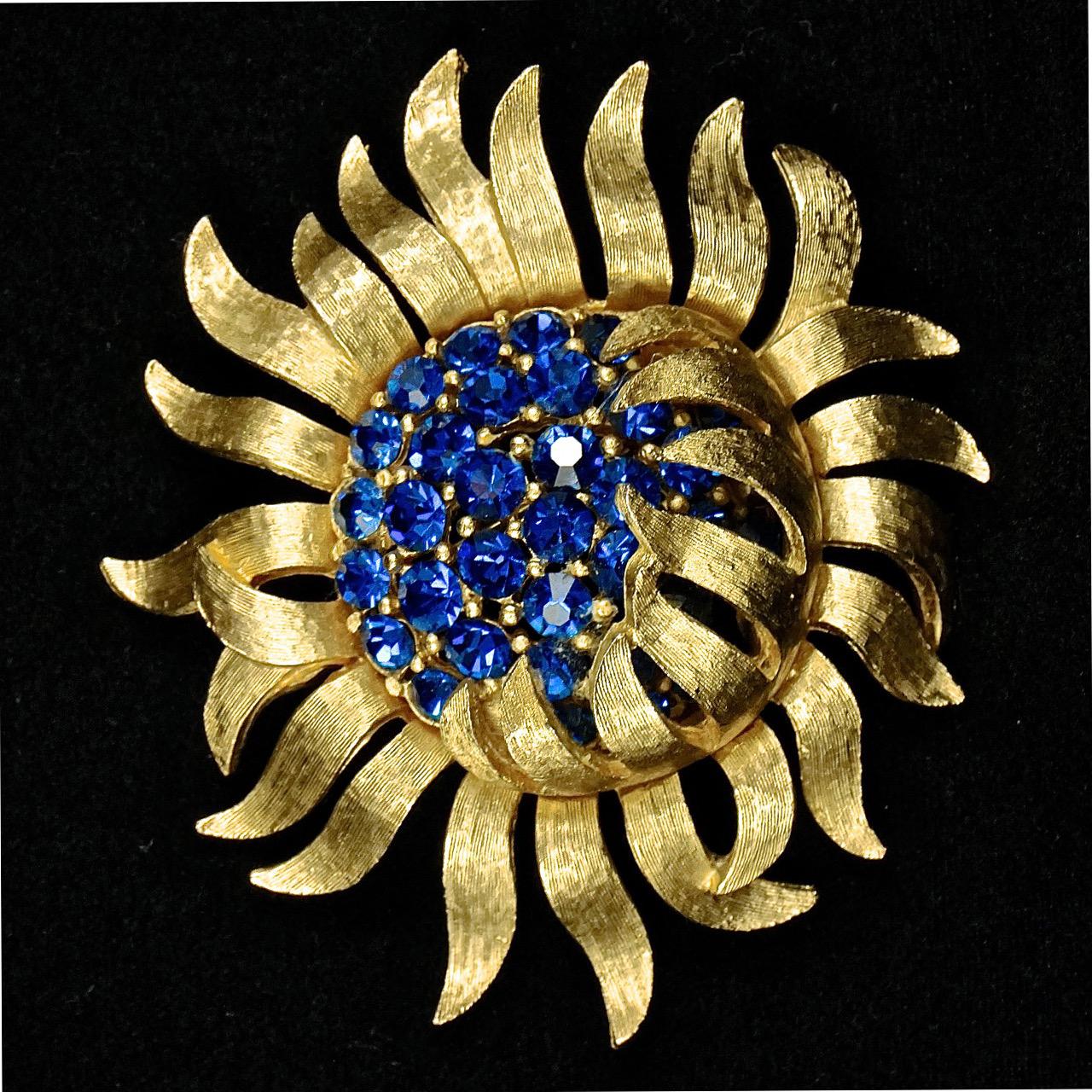 Women's or Men's Trifari Articulated Textured Gold Plated and Blue Rhinestone Flower Brooch