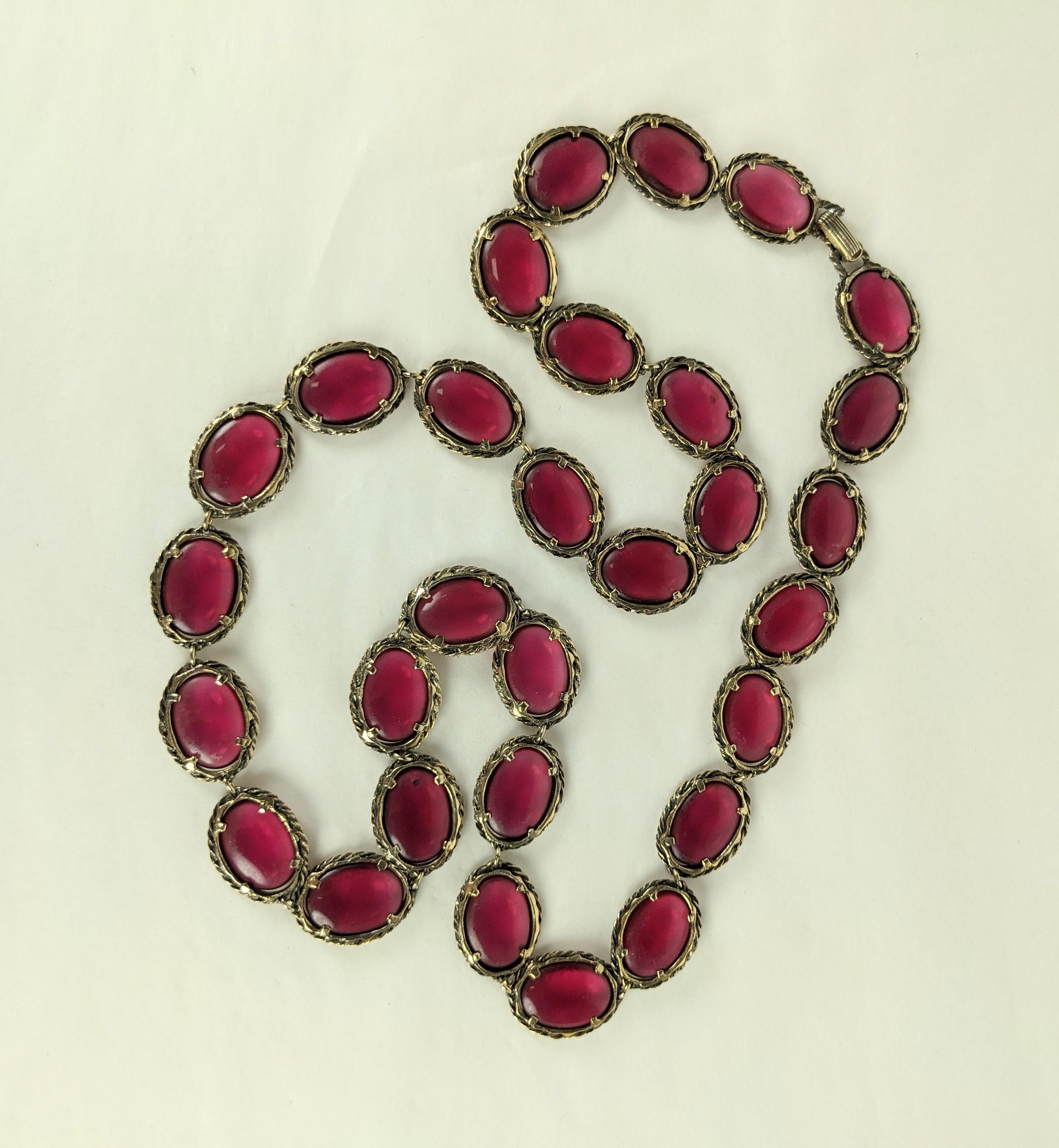 Attractive Trifari Bezel Set Ruby Chain from the 1950's. Antique gold settings with twisted wire work bezel.  28