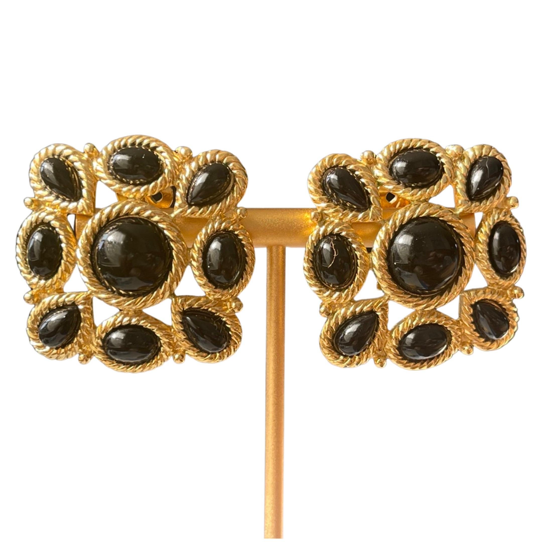 Modestly ornate these cabochon onyx, and the gold-tone filigree pair of Trifari earrings are incredibly elegant.  The black and gold along with the square style is the quintessential piece of jewelry, that gives you that pulled-together appearance