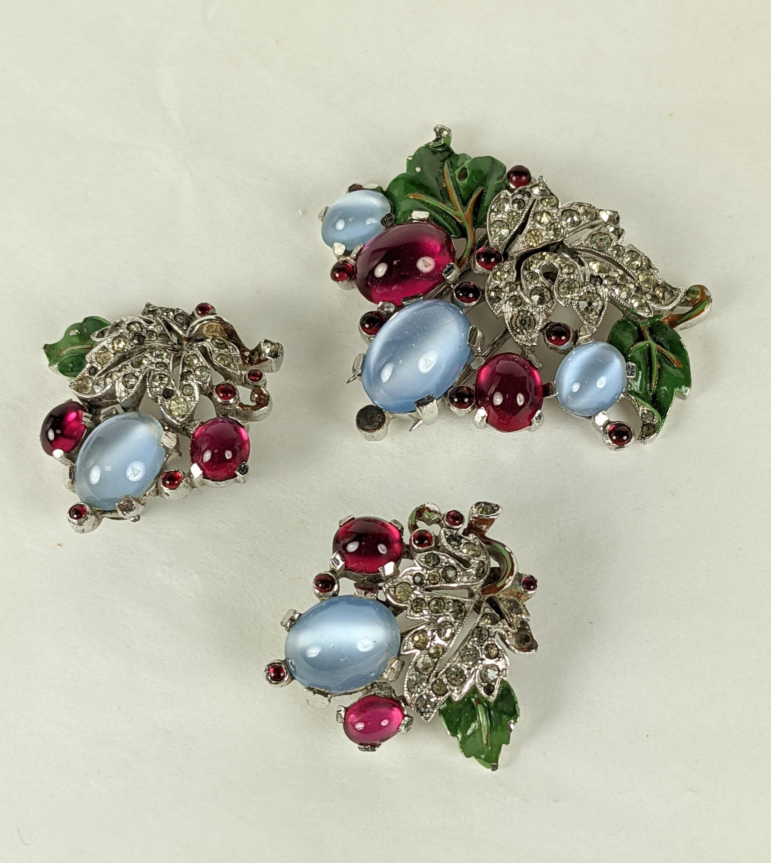 Trifari Cabochon Enamel Clip Set by Alfred Phillipe from the 1930's. Cab faux moonstones and rubies with enamel leaves. One clip with a pair of scatter pins. 1930's USA. 2