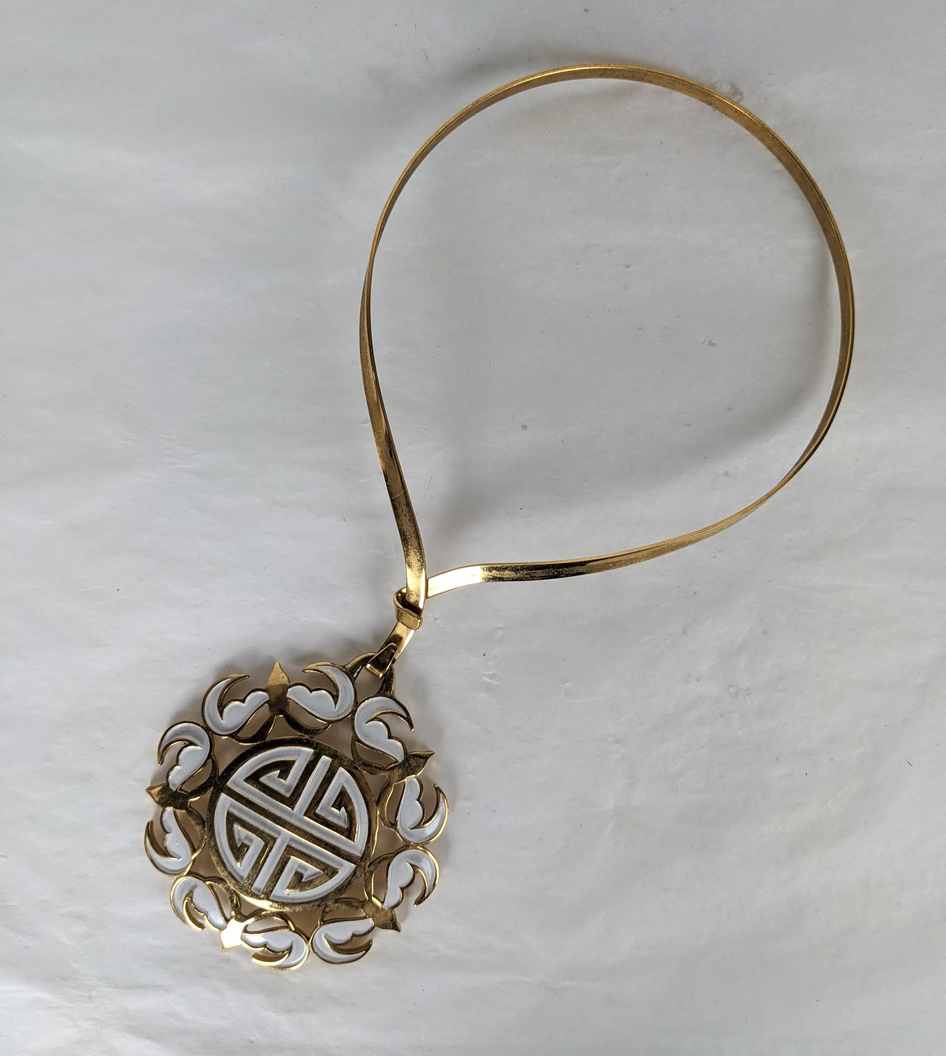 Trifari Chinese Symbol Mod Pendant from the 1960's. Hard collar with gold toned prosperity pendant with white enamel bats surround. Signed Trifari. Diameter 4
