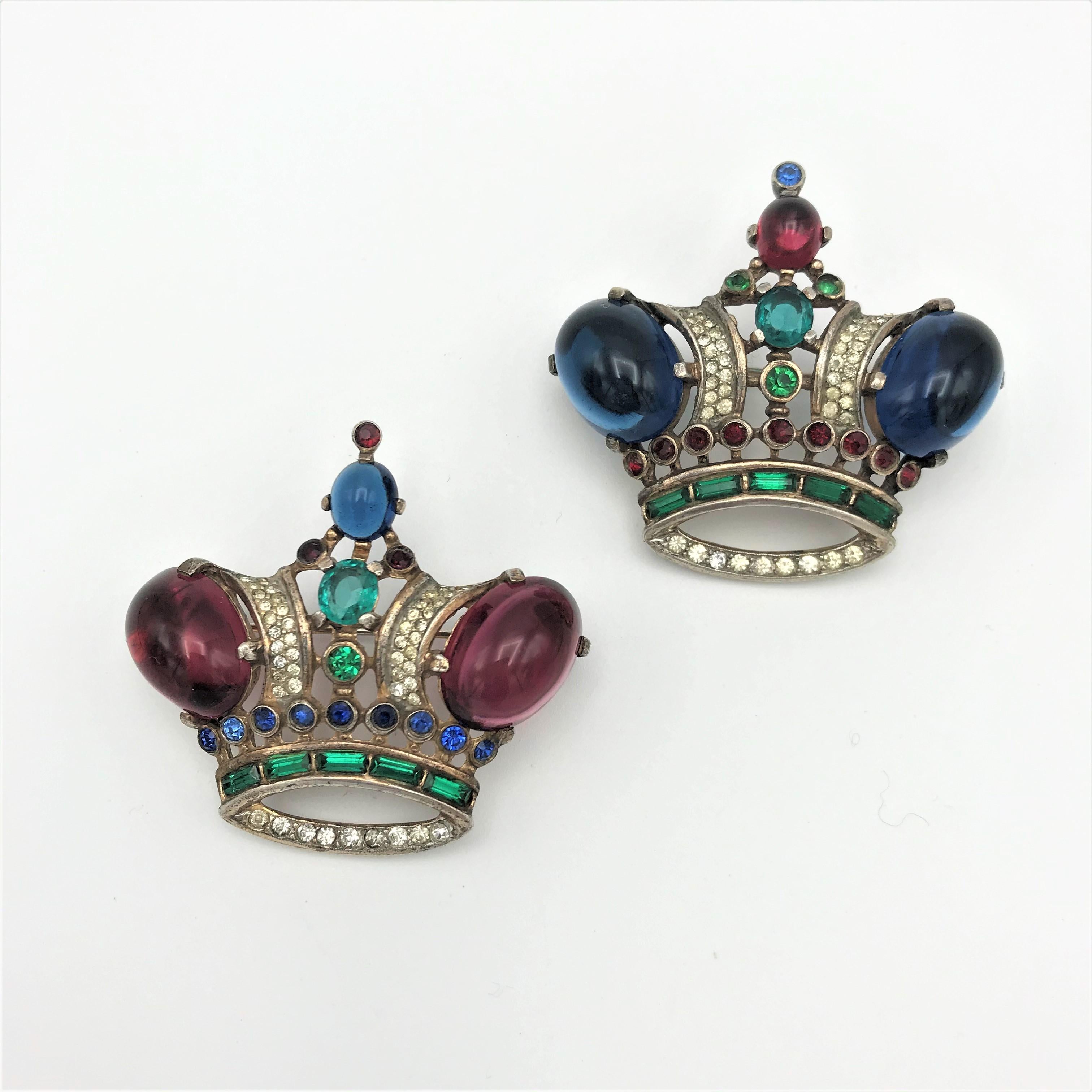 Large crown pin designed by Alfred Philippe, of vermeil sterling silver with prong-set sapphire blue and ruby red cabochons, emerald green baguettes, and emerald green, ruby red and clear rhinestones. 1940s. 
Measurement: 5 cm ( 1,97