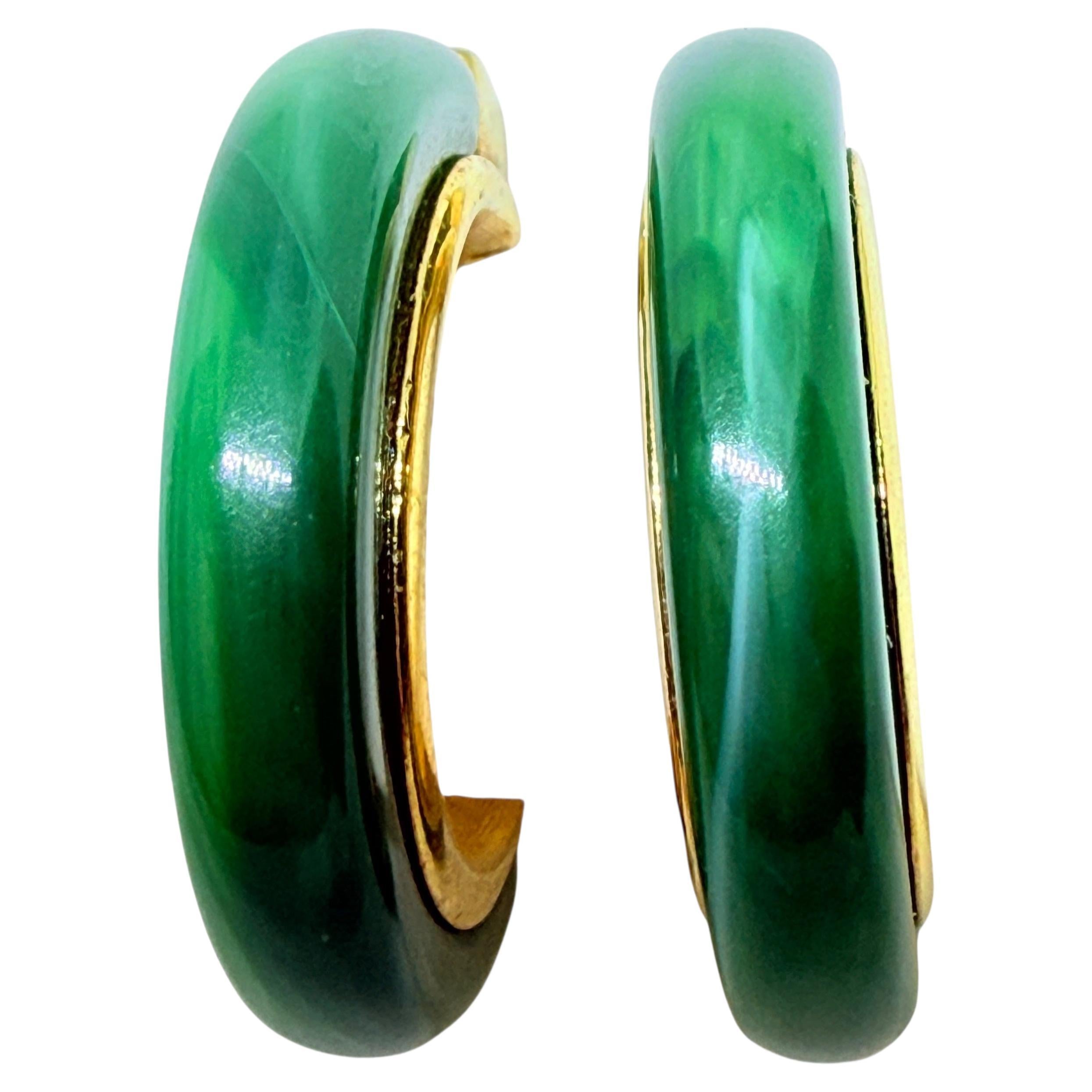 Trifari corona firmata Greene
Greene Greene lucite, orecchini a clip di design