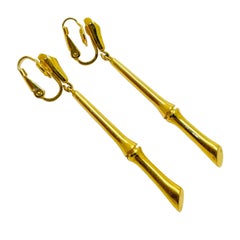 TRIFARI crown signed vintage gold bamboo dangle designer clip on earrings