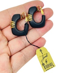 TRIFARI crown signed vintage gold tone black resin designer clip on earrings