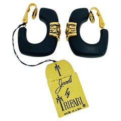 TRIFARI crown signed vintage gold tone black resin designer clip on earrings