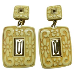 TRIFARI crown signed vintage gold tone carved lucite designer clip on earrings