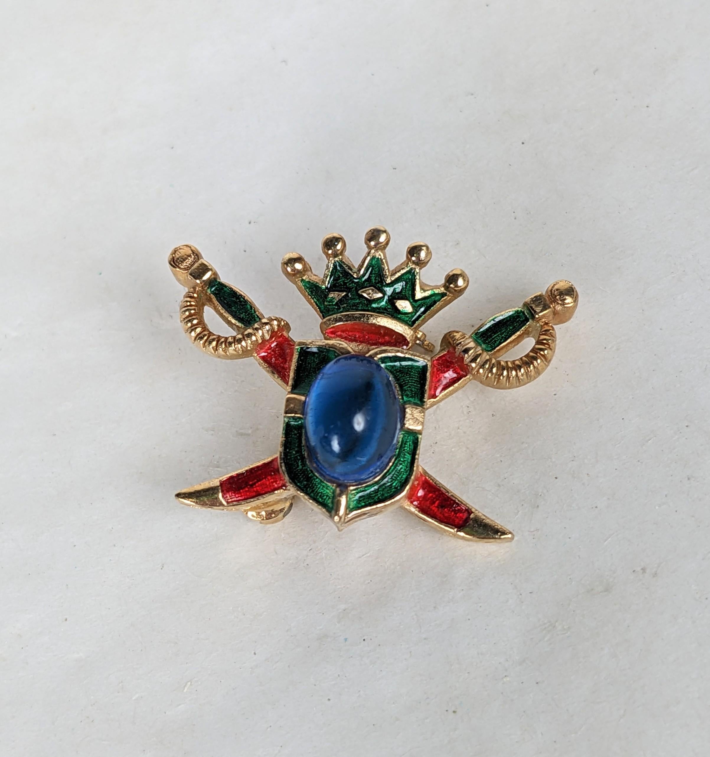 Charming collectible Trifari Enamel Heraldic Mini from the 1960's. Detailed enamel on gilt metal with sapphire glass cabochon. 1