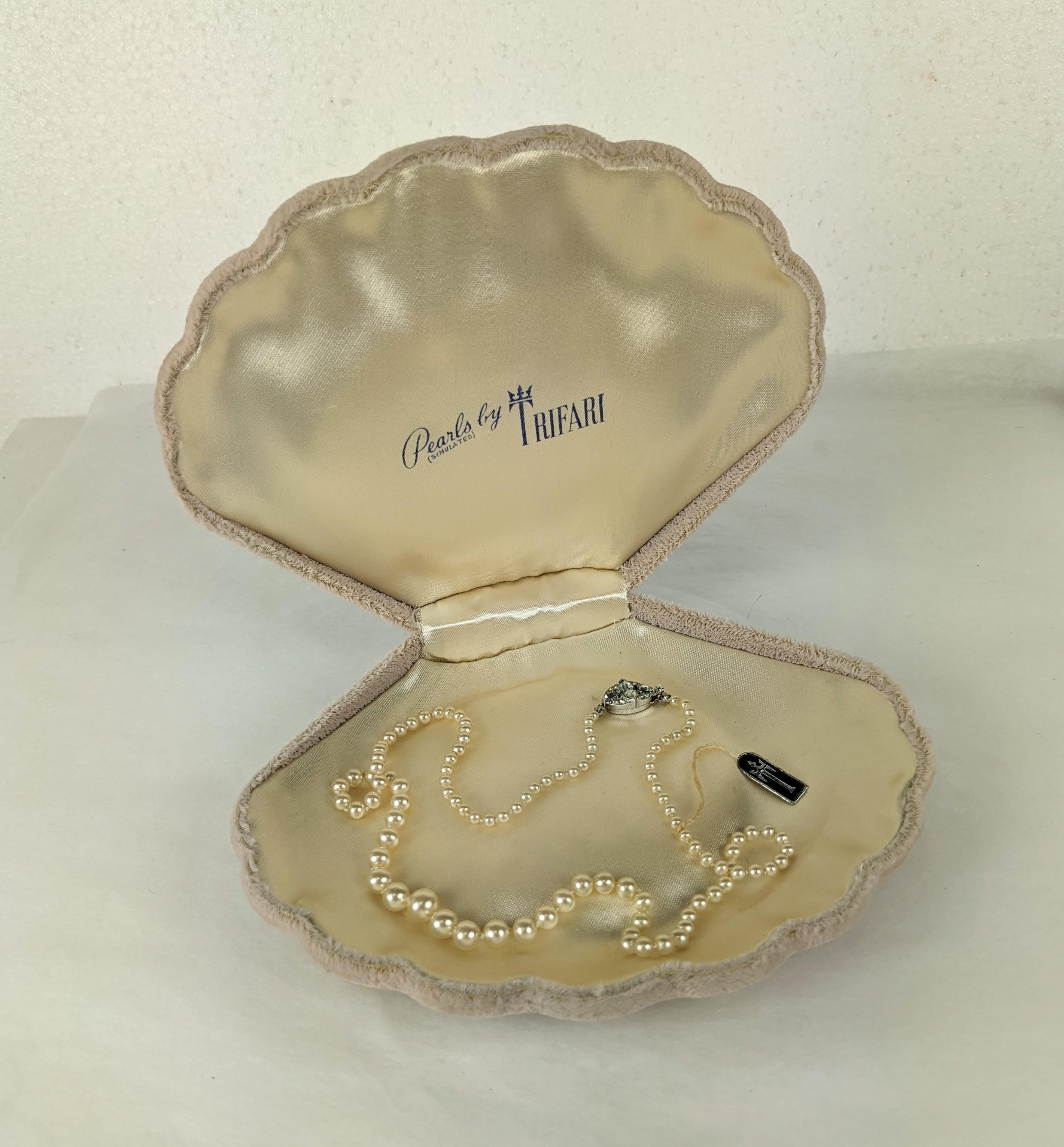 Trifari Faux Pearls with rare Original Shell Box in velvet. Sterling paste clasp signed Trifari Sterling dating it to the 1940's. 18