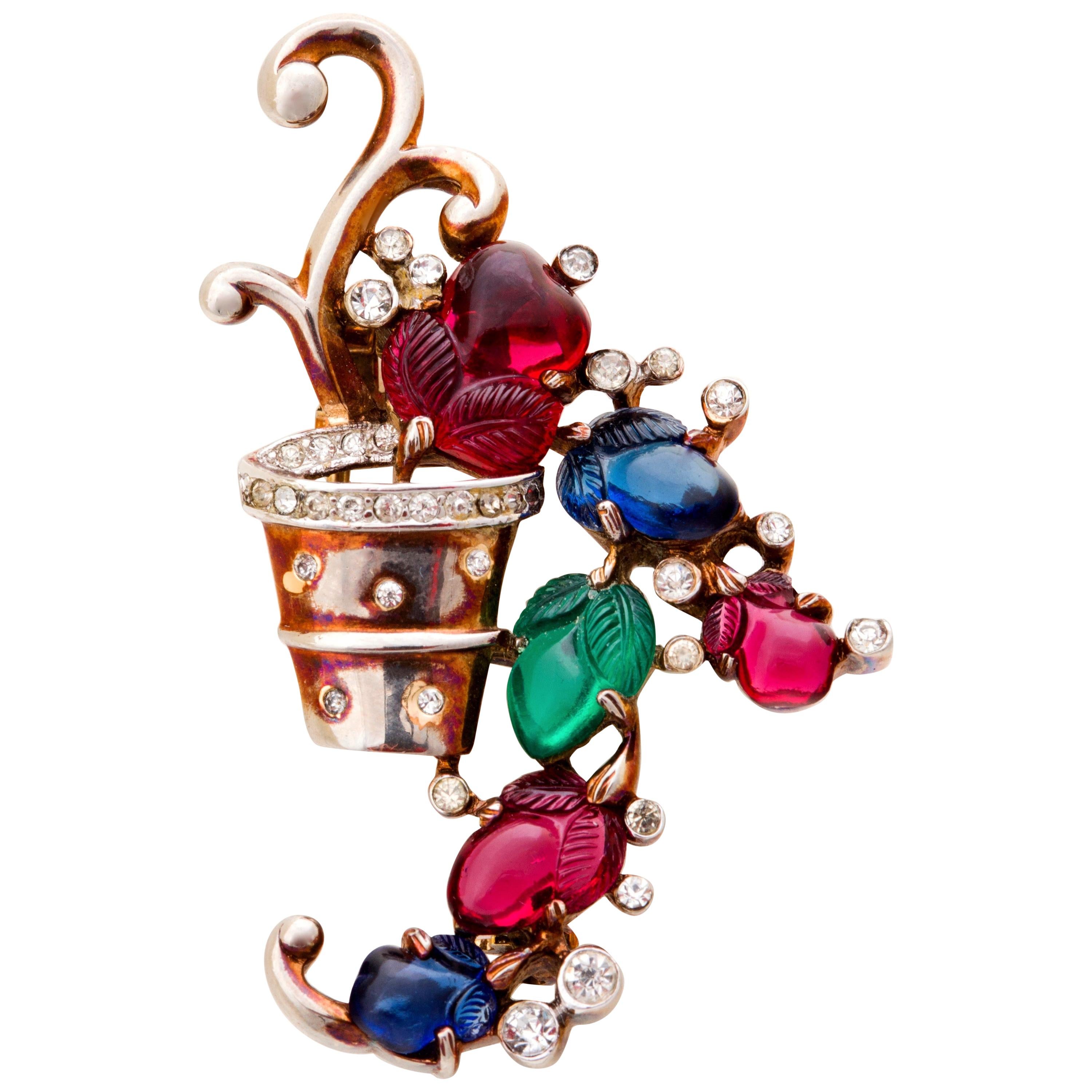 Fabulous Crown Trifari Tutti Fruiti Fruit Salad Clip Brooch by Alfred Philippe.  Vibrant colors form this flower pot of cascading fruit mixed with vibrant rhinestones.  Flower pot is more silver with hints of gilt which may over time have rubbed