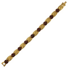 Vintage Trifari Gold Plated July Birthday Ruby Rhinestone Ribbon Link Bracelet