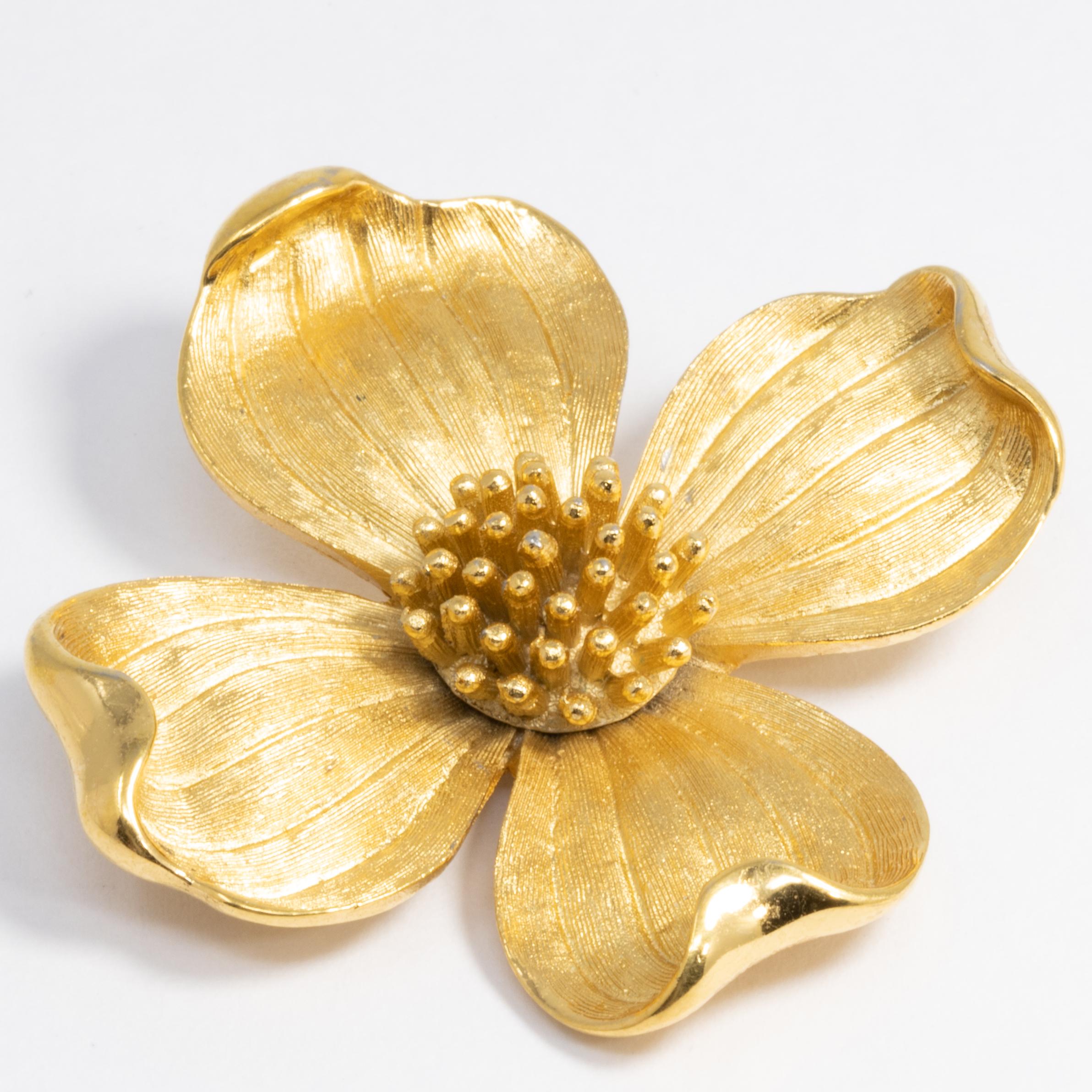 Vintage Trifari pin, featuring a beautiful blooming golden flower.

Gold-filled.

Marks / hallmarks: Trifari ©

If you are interested, please don't hesitate to reach out with questions or make an offer!