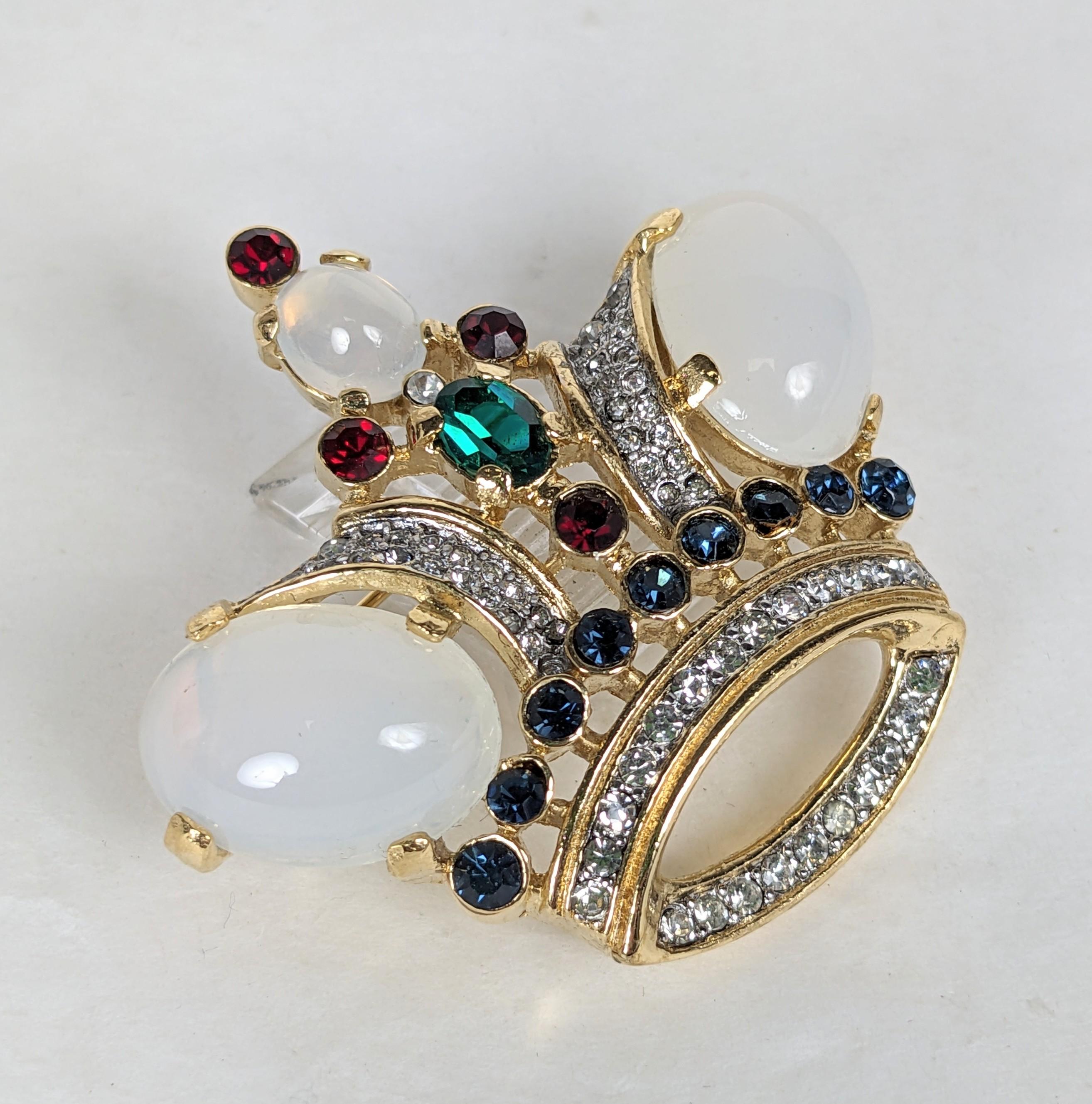 Trifari Moonstone Jeweled Crown from the 1960's. A design from the 1940's remade by Trifari a few decades later. Faux moonstone with red, blue, green crystals on gilt metal with pave rhinestones. 2