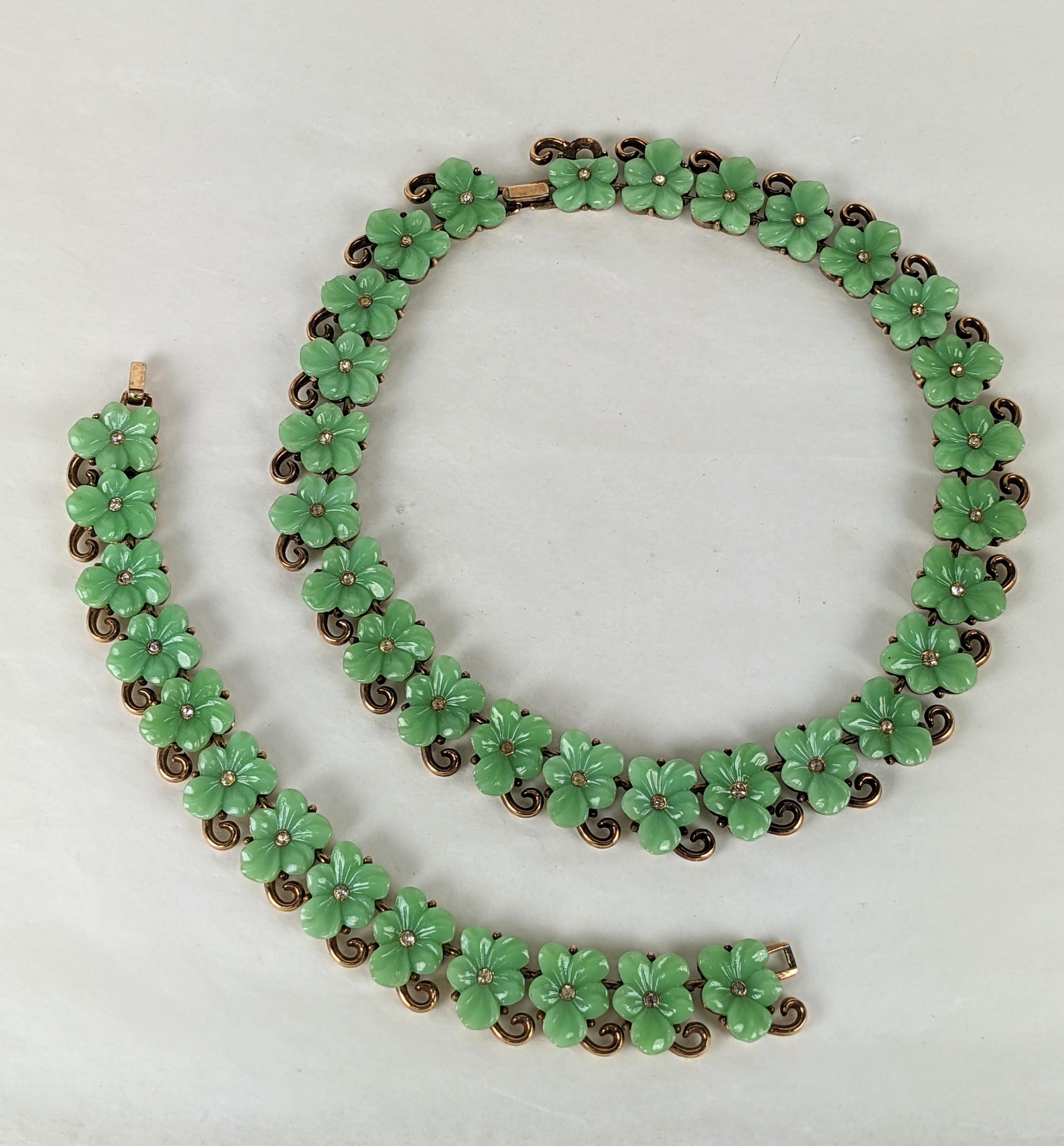 Charming Trifari Jade Pansy Suite from the 1940's set in rose gold plate with molded glass pansies and tiny pastes. Matching bracelet with flexible link pieces. Signed. 1940's USA. Necklace 15