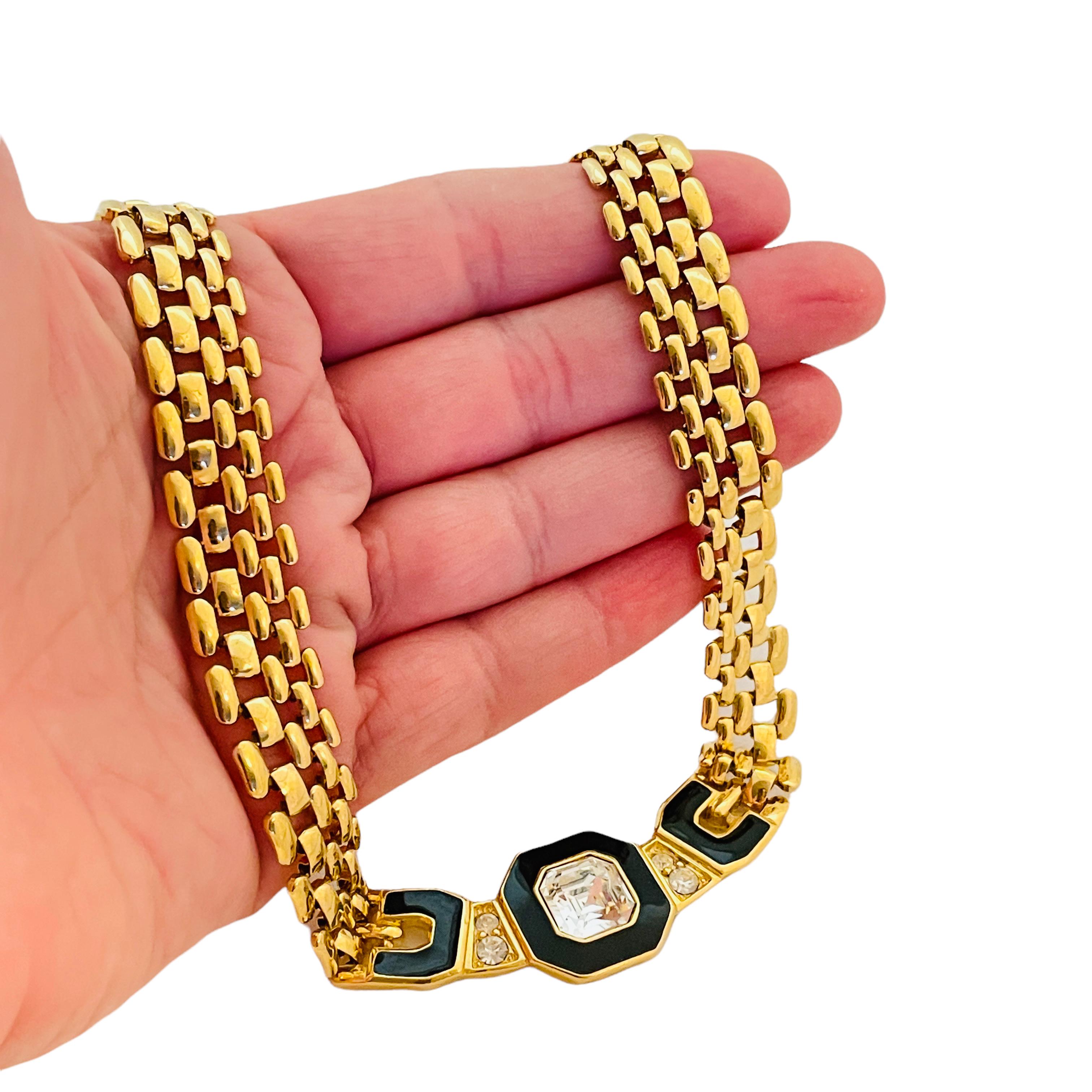 DETAILS

• signed TRIFARI

• gold tone with enamel and crystal

• vintage designer necklace
  

MEASUREMENTS  

• 17