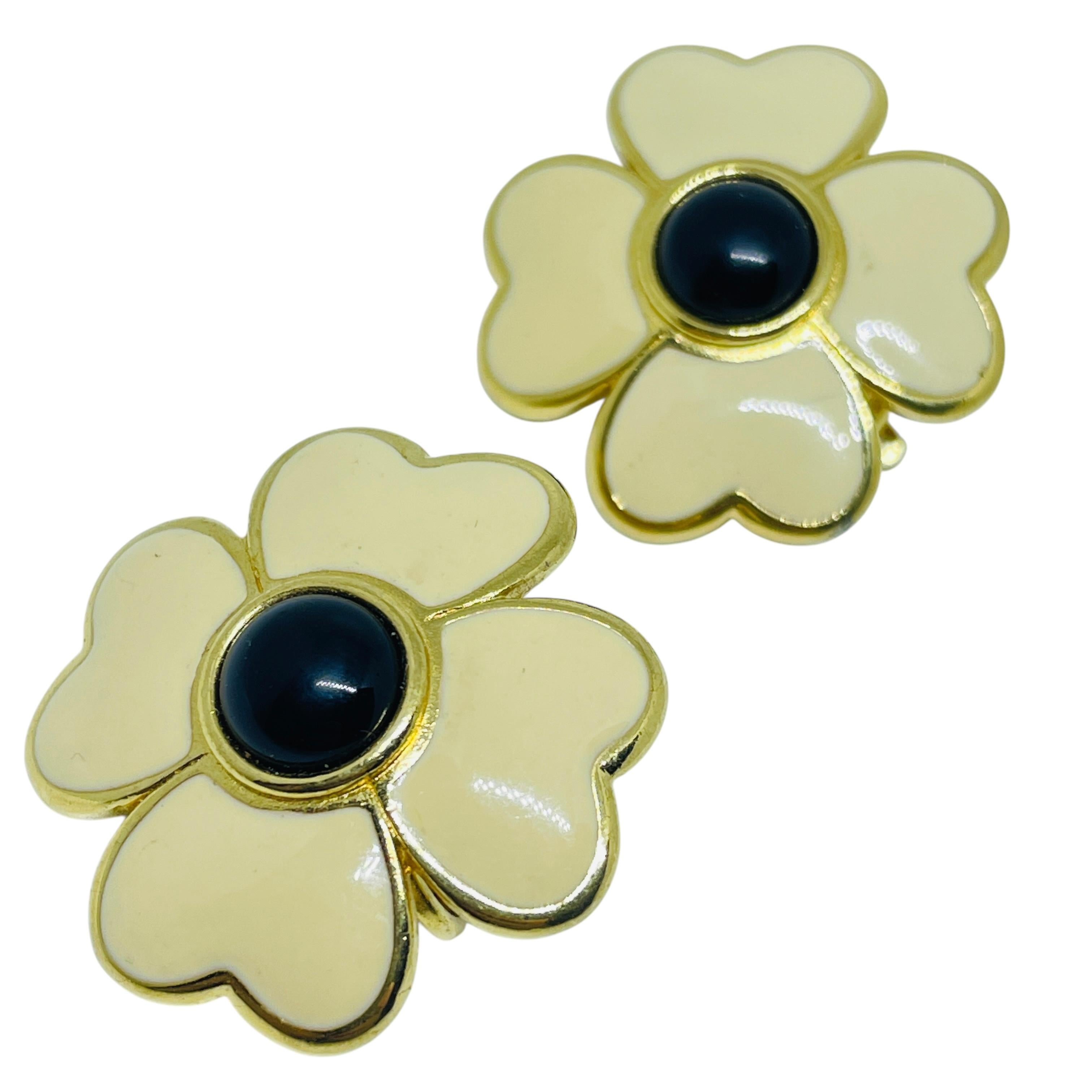 Women's or Men's TRIFARI signed vintage gold tone enamel flower designer clip on earrings For Sale