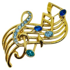Trifari spilla firmata d'epoca con strass, note musicali, firmata TRIFARI