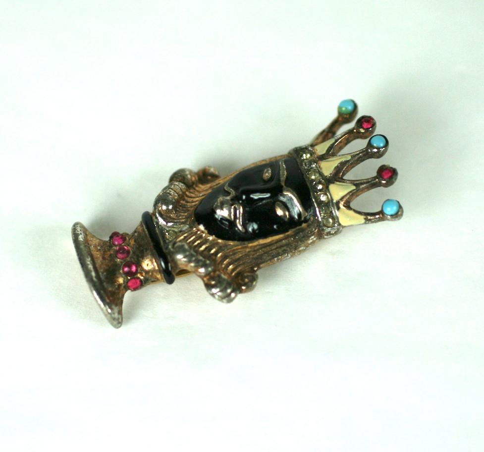 Trifari Sterling Alfred Philippe  Black King  Chess Piece Clip Brooch of gold plated sterling, crystal  rhinestones, black cold enamel with faux ruby and turquoise cabochons. 
Signed Trifari with Crown on fur clip, sterling ,Des Pat No