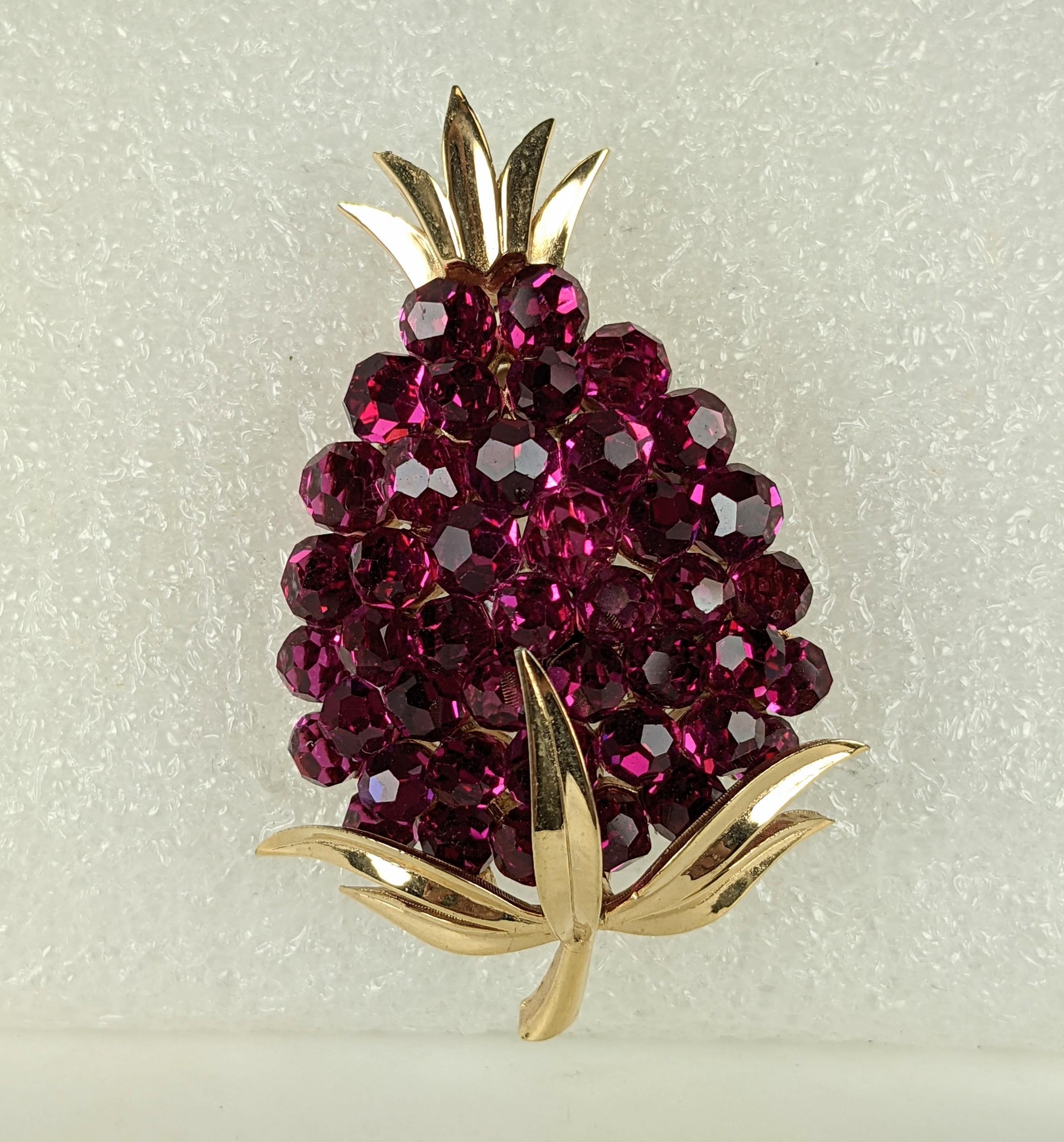 Trifari Swarovski Crystal Fuschia Pineapple Brooch from the 1960's. Dozens of faceted crystal globes are used as 
