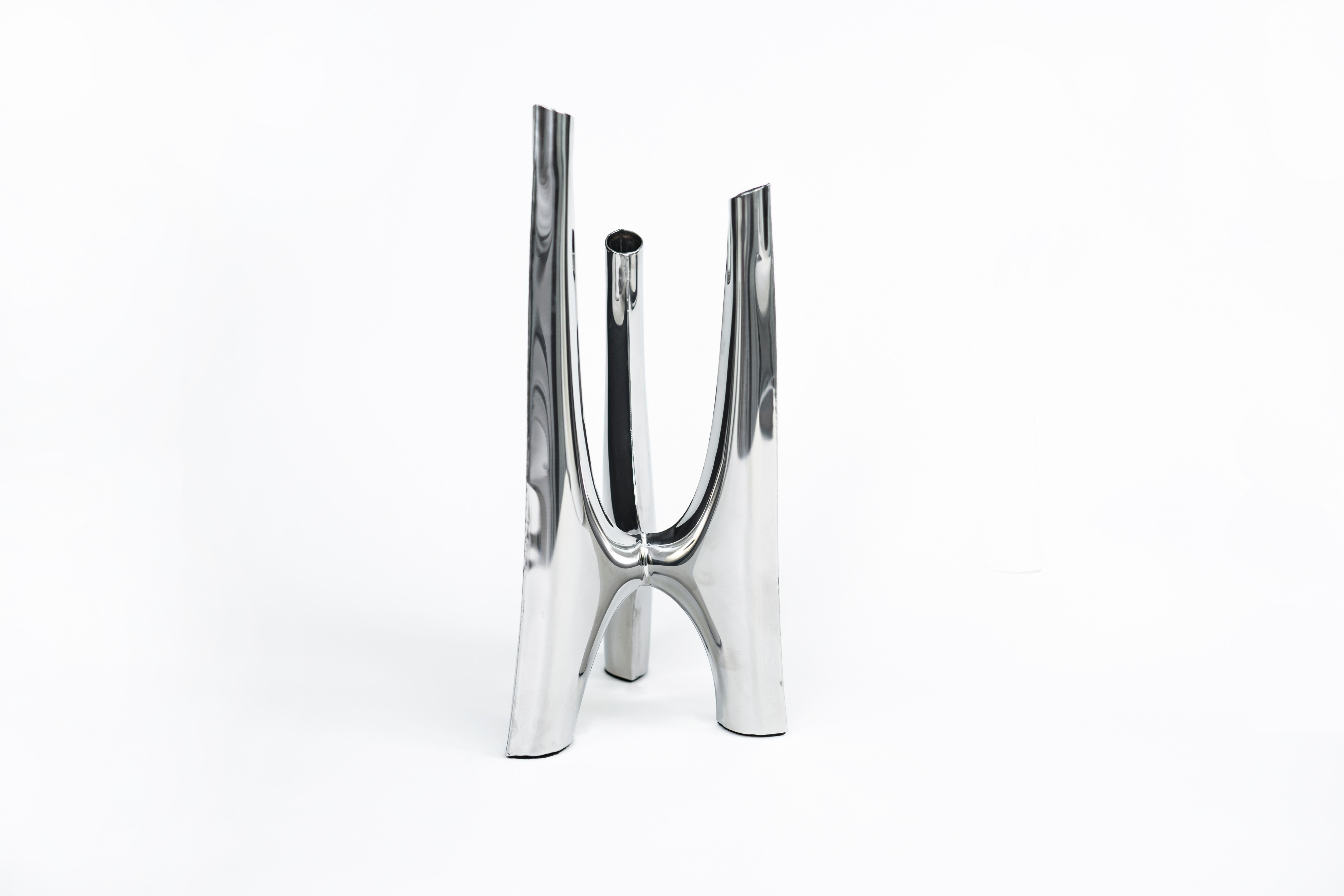 Triglav- Candelabrum, large
Original piece by Zieta, delivered with certificate. 

Polished stainless steel
Candles included

Measures: H83 x 40 cm.