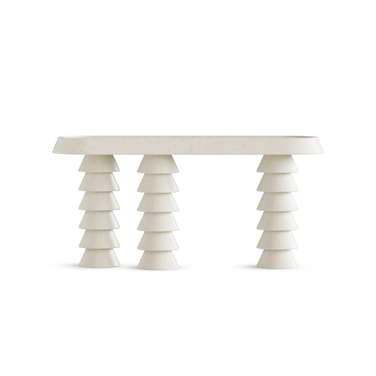 Trigono Creme Console Table by Studio Anansi
Dimensions: D46 x W153 x H74 cm
Materials: limestone
Custom stones available.. Please contact us.

Studio ANANSI, founded by Evan Jerry in 2018, represents a reection on modernity with a nod to the