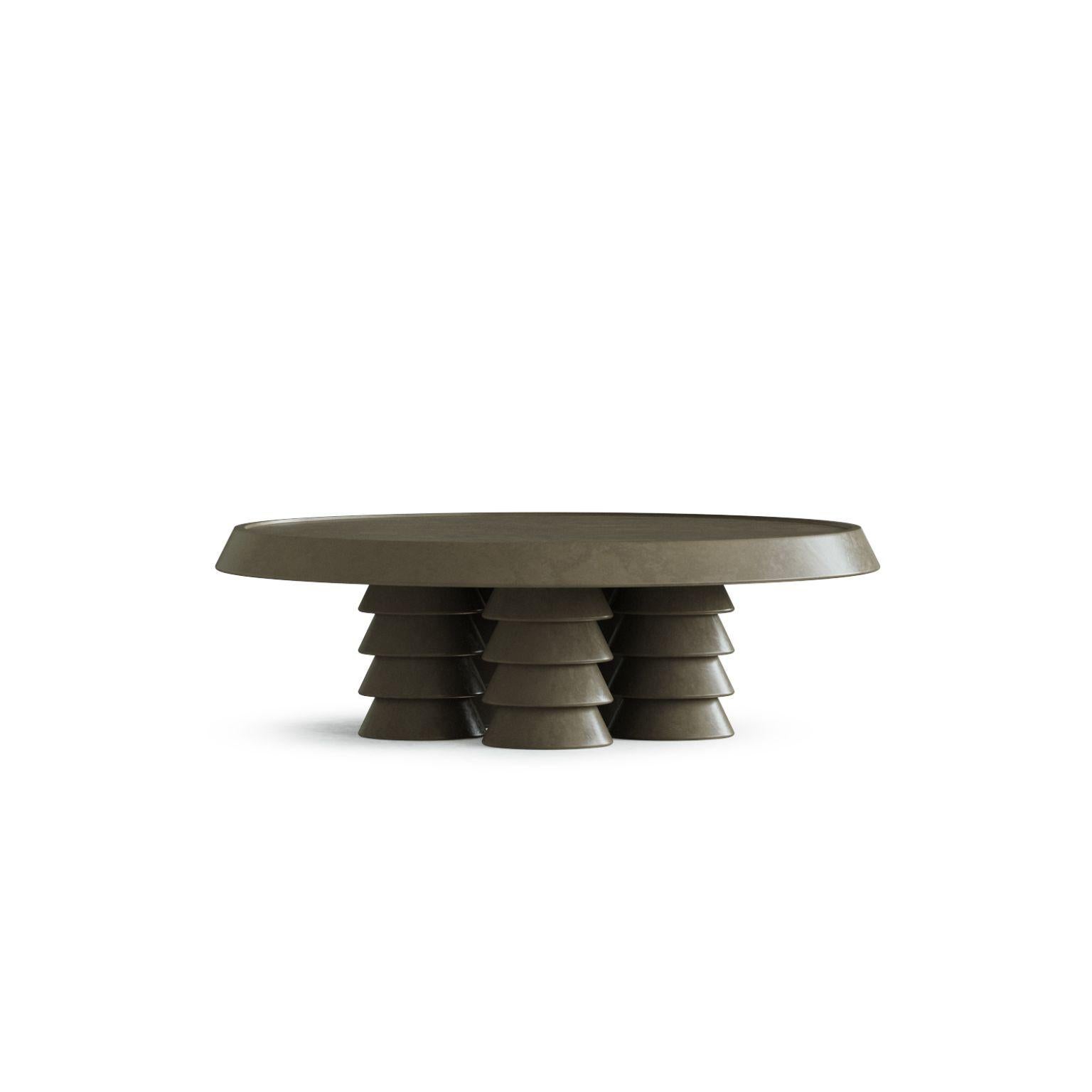 Trigono Dark Grey Coffee Table by Studio Anansi
Dimensions: D122 x W122 x H38 cm
Materials: limestone
Custom stones available. Please contact us.

Studio ANANSI, founded by Evan Jerry in 2018, represents a reection on modernity with a nod to the