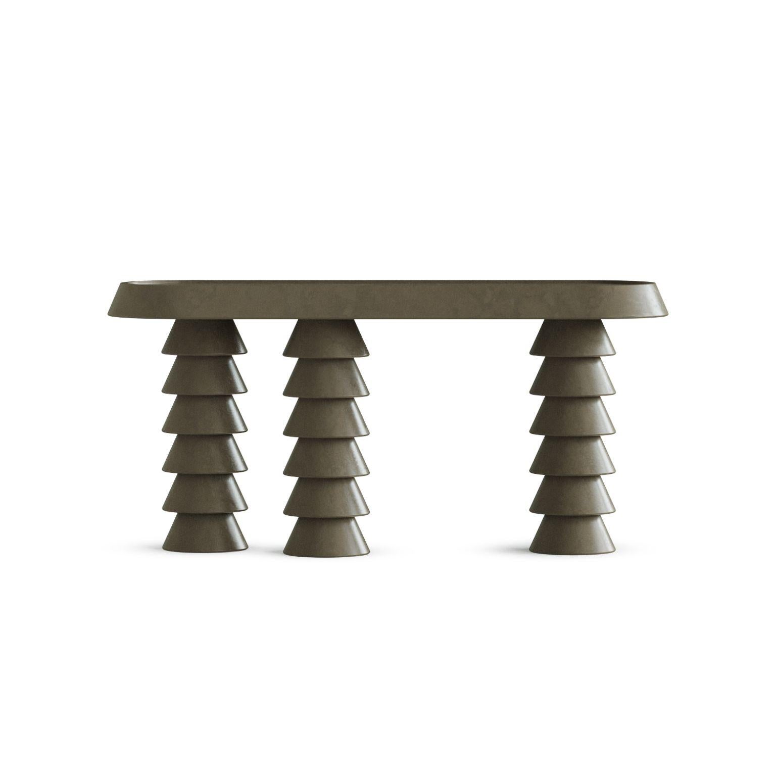 Trigono Dark Grey Console Table by Studio Anansi
Dimensions: D46 x W153 x H74 cm
Materials: limestone
Custom stones available.. Please contact us.

Studio ANANSI, founded by Evan Jerry in 2018, represents a reection on modernity with a nod to the