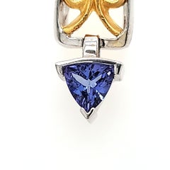 Anhänger mit Tansanhänger im Trilliant-Schliff Cts 0.73 und runden Diamanten