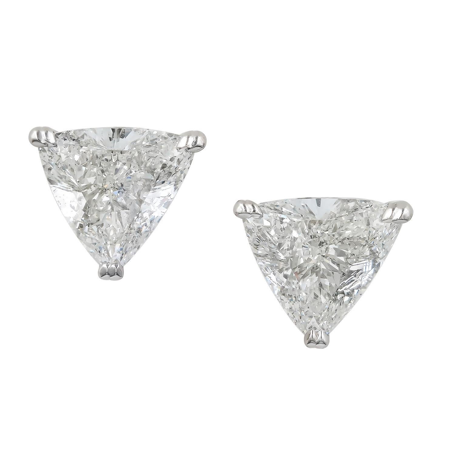 Diamond stud earrings.

Say NO to boring typical round diamond studs!
Shine your OWN way.
Amazing pair of very high quality triangle cut 
Diamonds perfectly matched as diamonds stud earrings.
With a total carat weight of almost SEVEN carats 
this