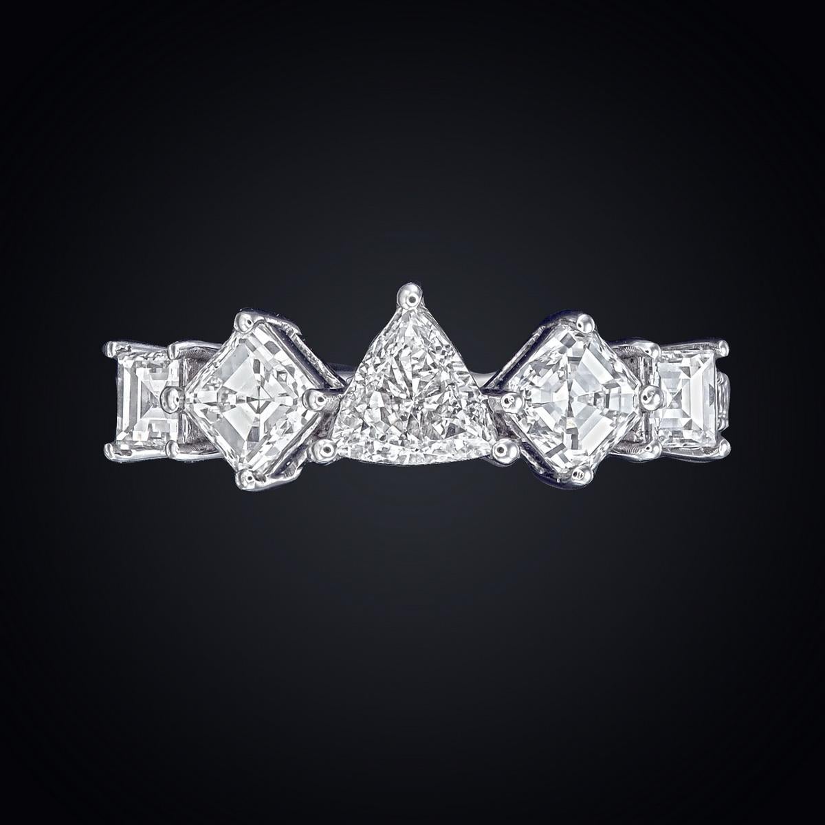 18kt white gold ring with diamonds
  
  Gold colour & karat: White gold 18kt
  Weight: 2.969 grams
  
  Set with-
  Stone type: Diamond
  Shape: Trillion
  Carat: 0.03 
  Colour: G
  Clarity: VS
  
  Surrounding Stones: Diamonds
 1) Side Ascher