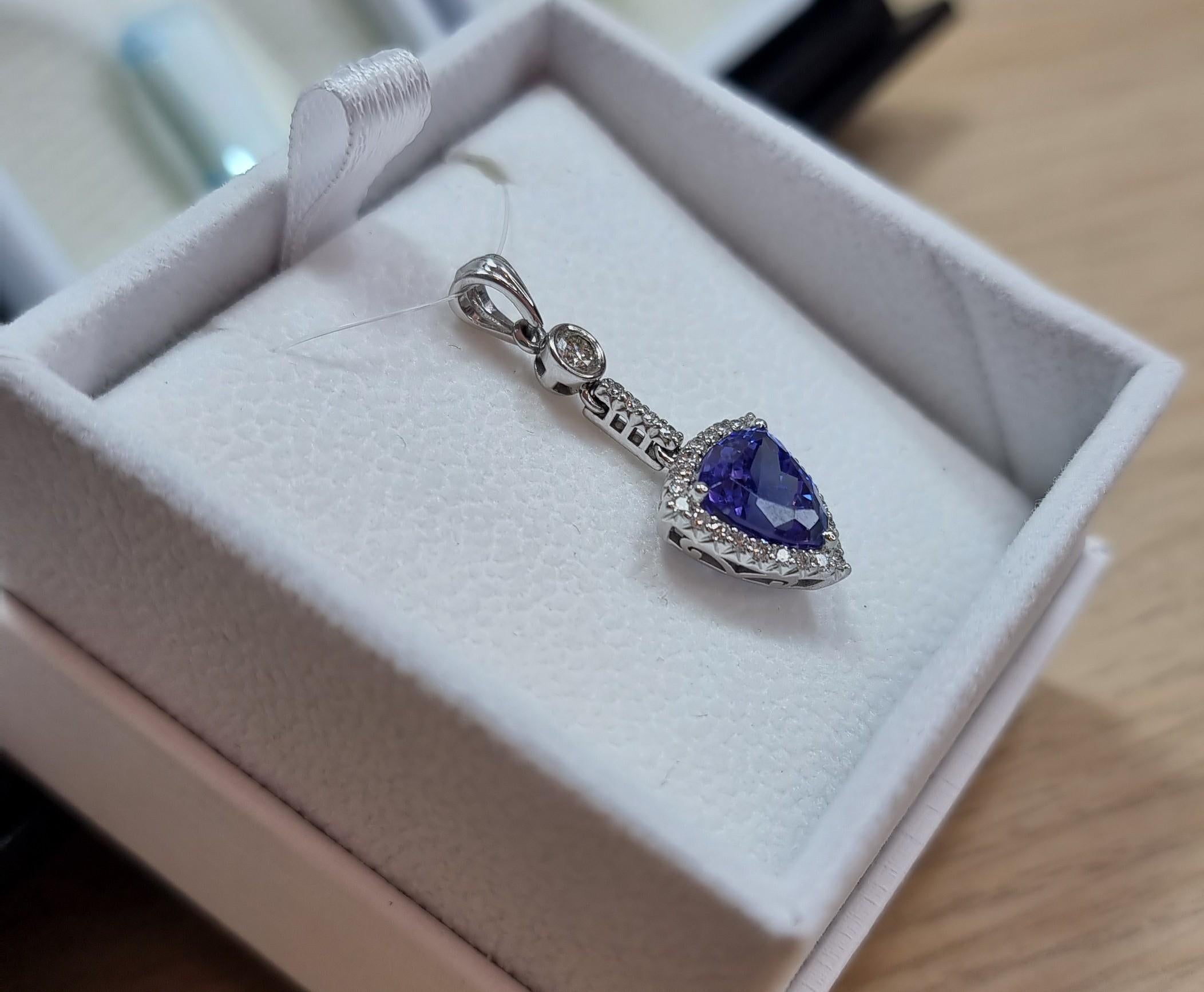 Trillion Cut Trilliant Tanzanite & Diamond Halo Pendant