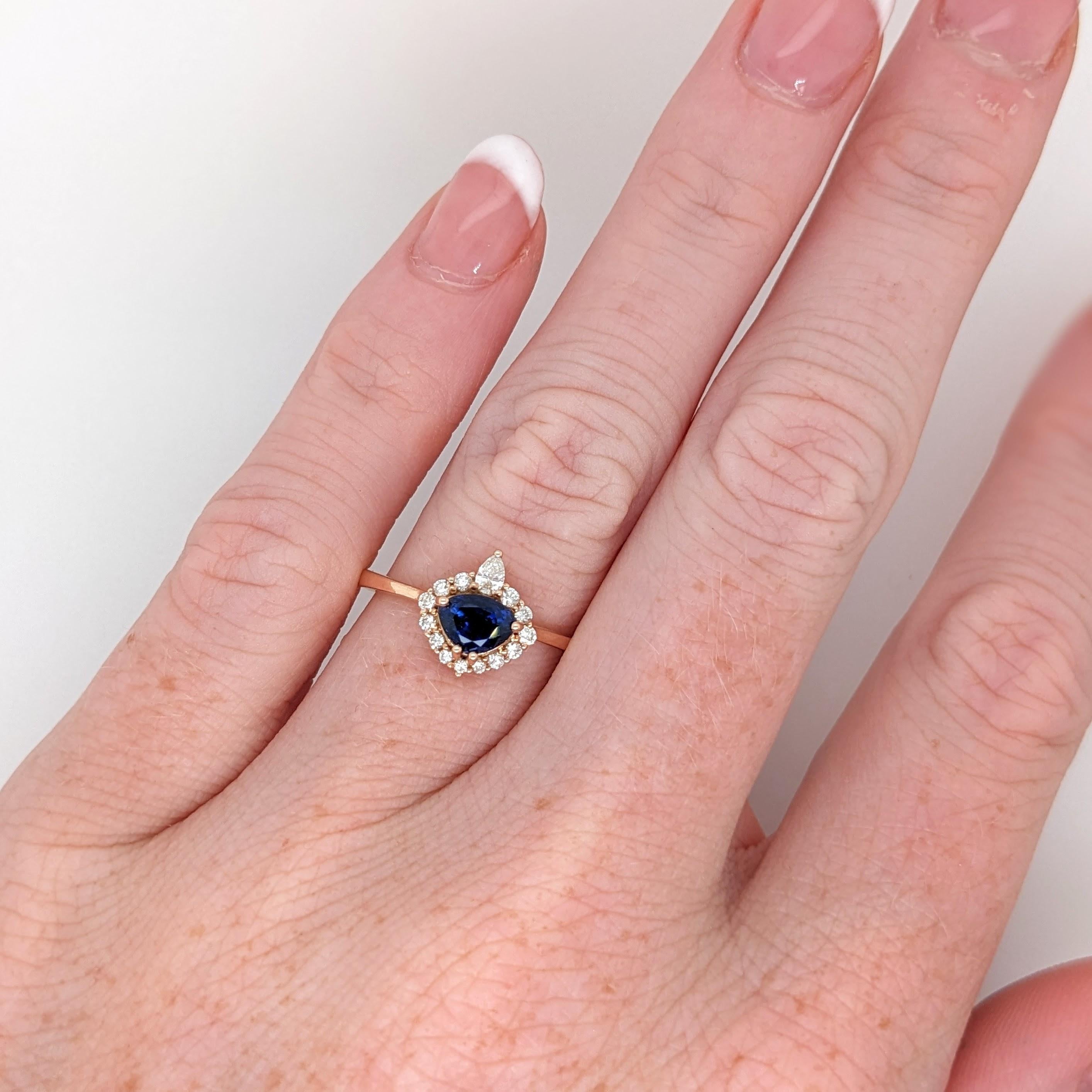 Stunning is an understatement for this ring! The all natural diamond halo and accents perfectly emphasize the vivid blue in this sapphire from Ceylon. The halo design gives a slightly vintage feel but in the most elegant way.

**We offer