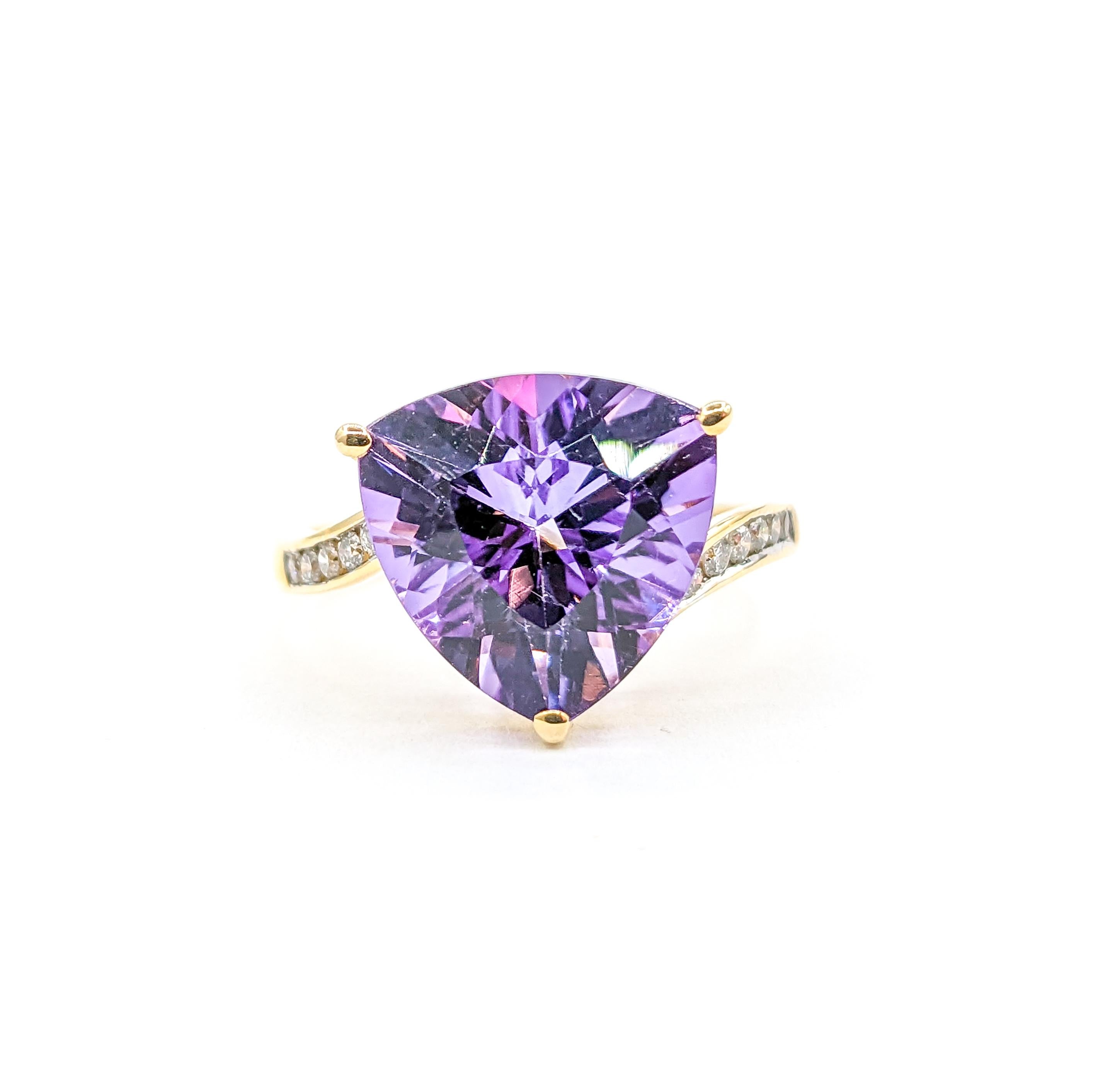 Trillion Cut Amethyst & Diamond Ring in 14K Gold

This stunning ring showcases a resplendent 12mm Amethyst at its heart, beautifully crafted in 14K yellow gold. Further enhancing this mesmerizing gem are dazzling round diamonds, with a total carat