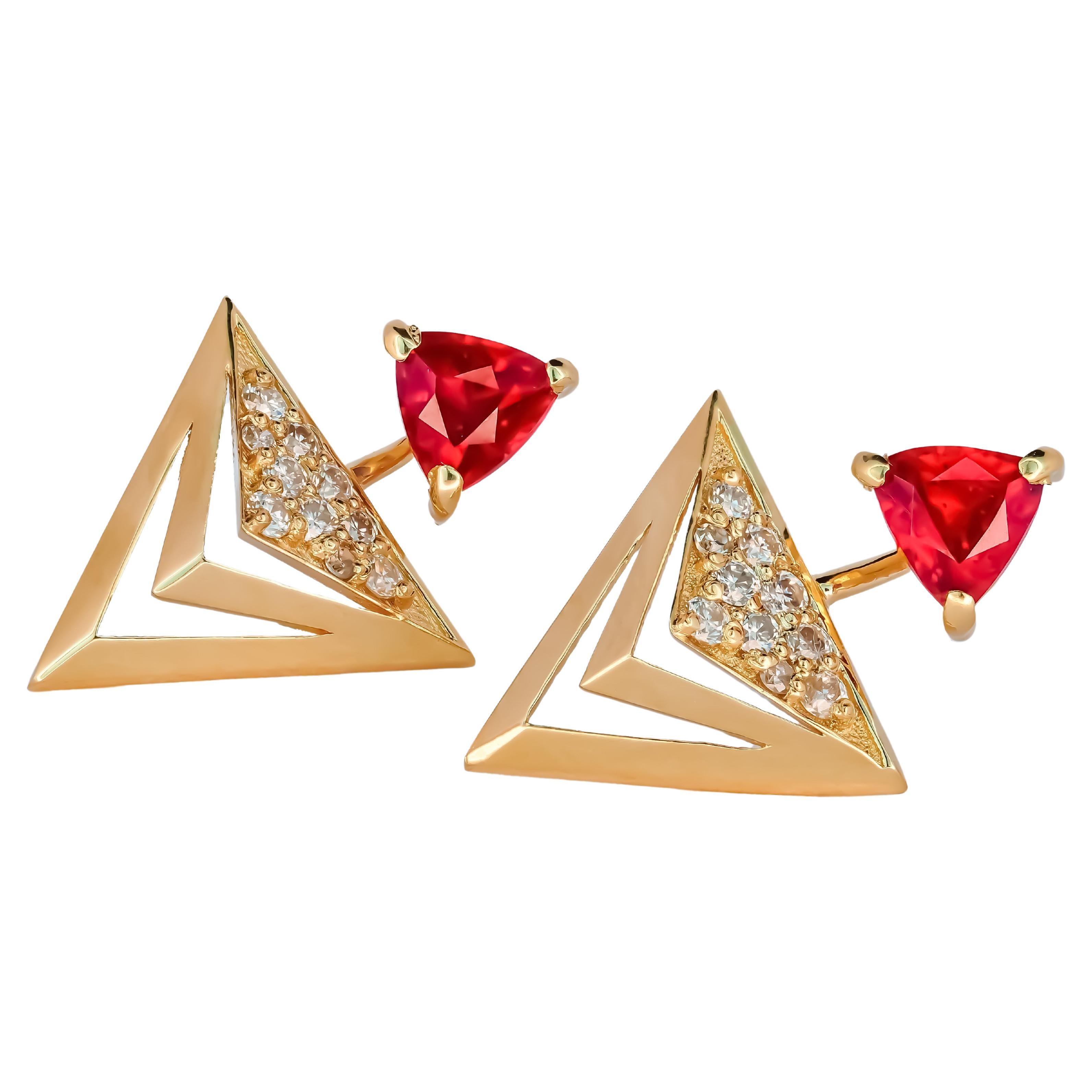 Trillion cut ruby stud earrings in 14k solid gold.  For Sale