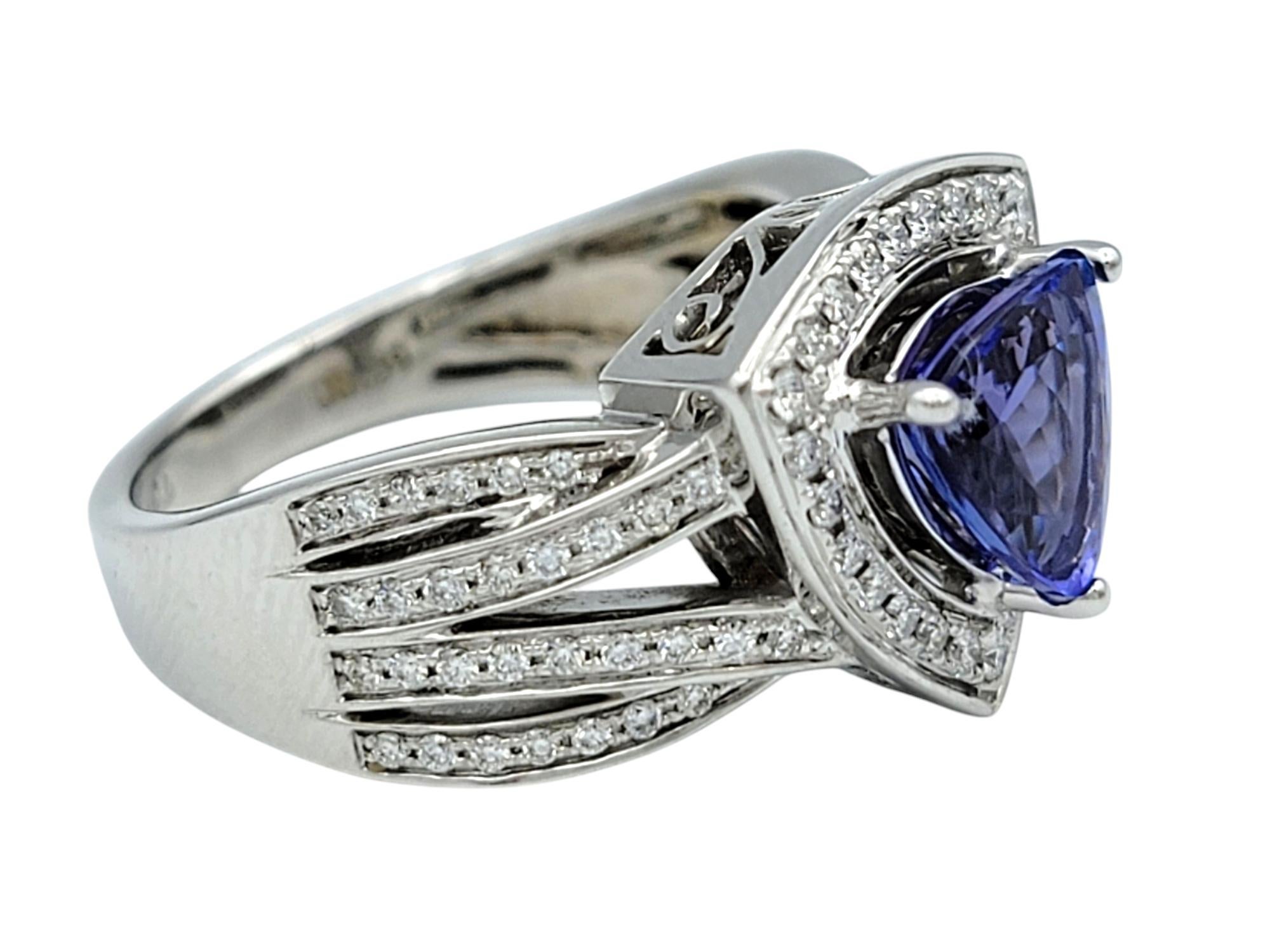 Contemporary Trillion Cut Tanzanite and Multi-Row Pavé Diamond Band Ring 18 Karat White Gold For Sale