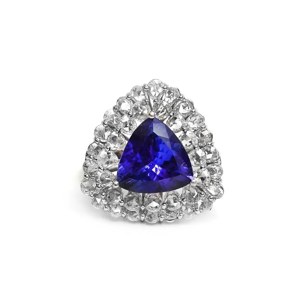 Forged from 18-karat gold, this unique ring is meticulously set with a 5.25-carat Tanzanite and 3.4 carats of glistening diamonds.

This 5.25-carat Tanzanite ring transcends mere adornment—it's a rare and timeless testament to love, artistry, and