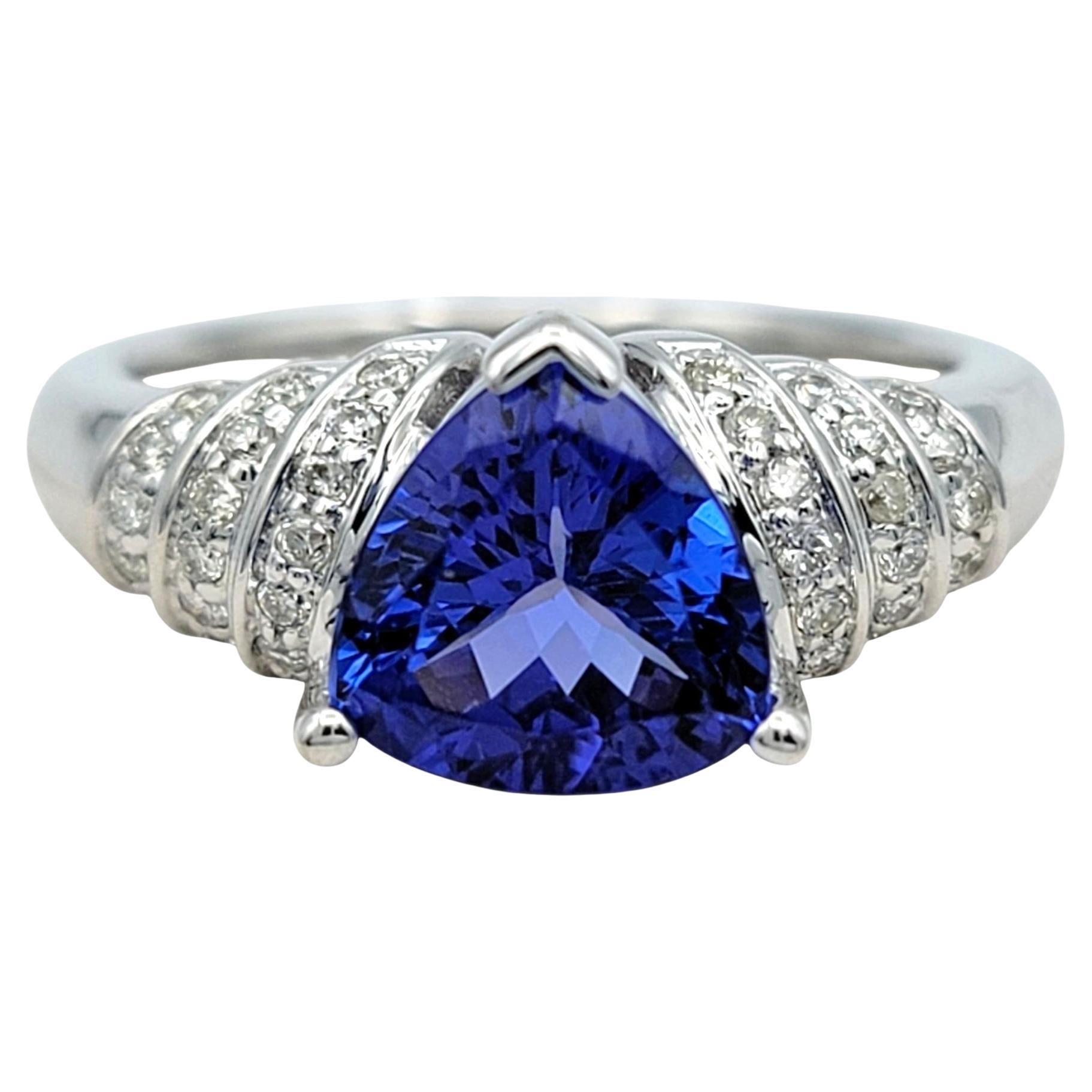 Trillion Cut Tanzanite Ring with Ridged Diamond Accents in 18 Karat White Gold