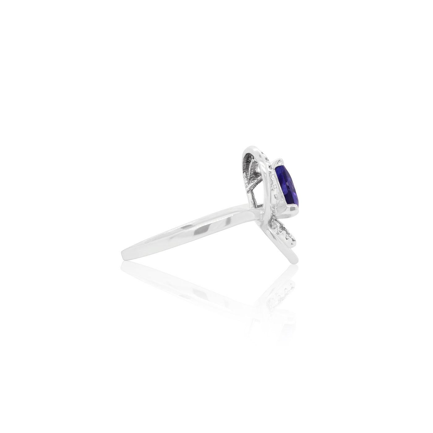 Material: 14K White Gold
Center Stone Details: 1 Trillion Tanzanite at 1.12 Carats - Measuring 7.5 millimeters
Side Stone Details: 24 Round Brilliant White Diamonds at 0.12 Carats Total Weight Color H-I / Clarity SI
Alberto offers complimentary