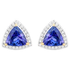 Clous d'oreilles en or 14 carats avec tanzanite taille trillion et halo de diamants 4,74 carats