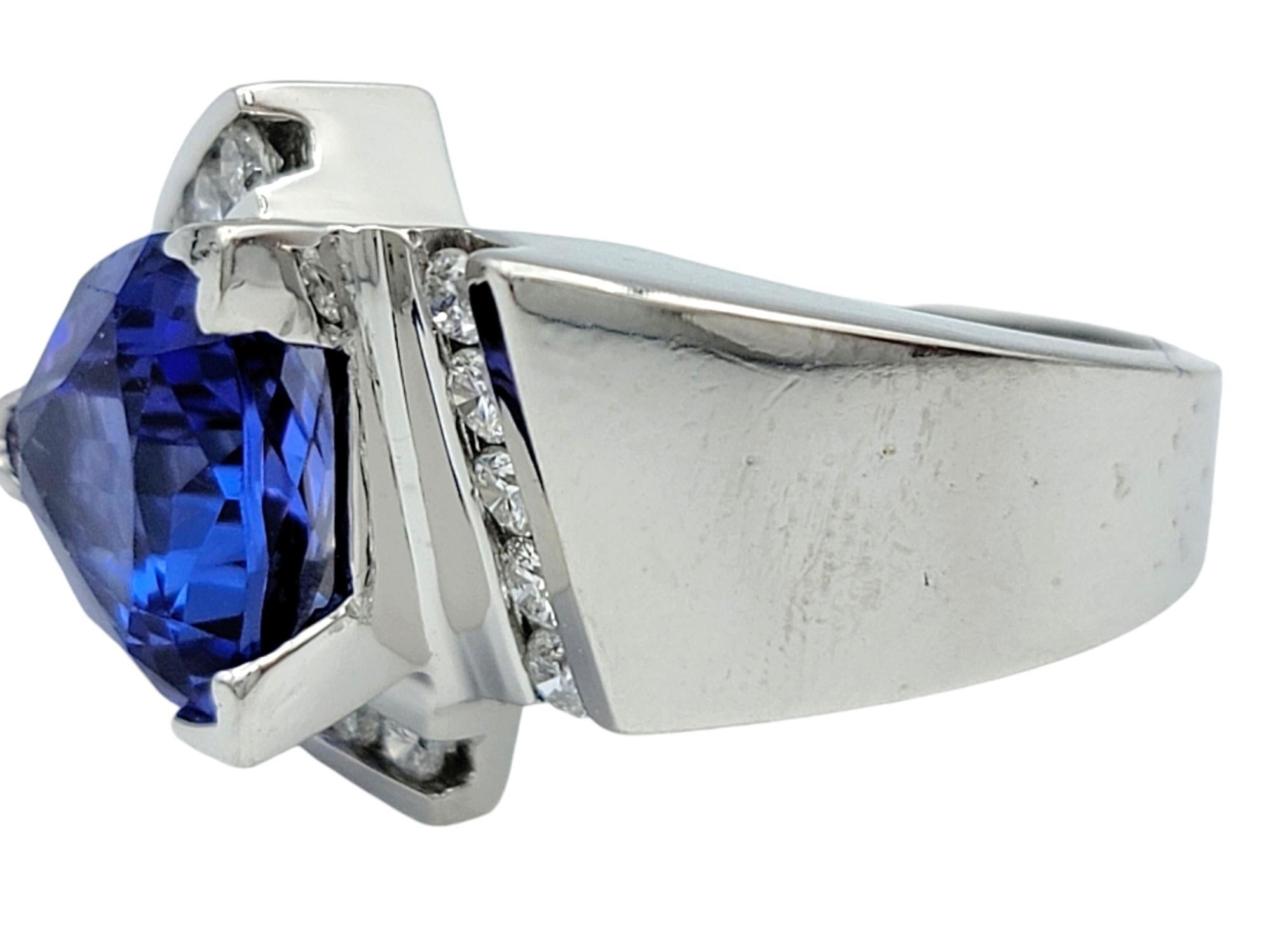 Women's Contemporary Trillion Cut Tanzanite Cocktail Ring with Diamonds in 14 Karat Gold For Sale