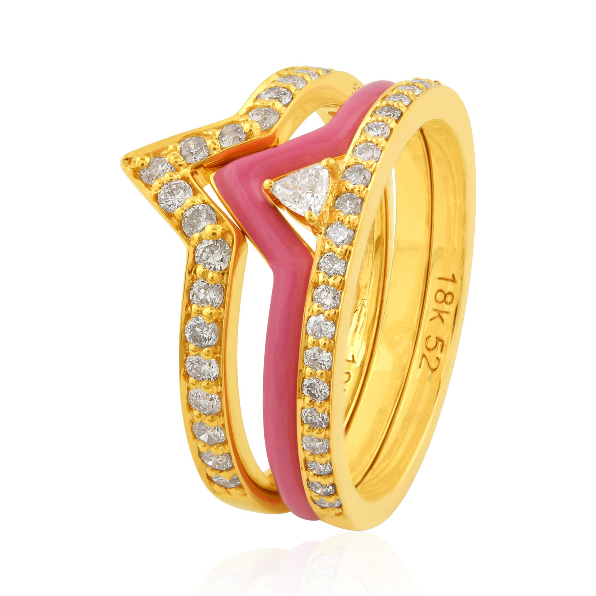 The Trillion Diamond Triple Chevron Ring Set in 14k gold is a luxurious and sophisticated piece of jewelry that exudes elegance and style. The combination of the sparkling trillion-cut diamonds, rich gold, and intricate enamel work results in a