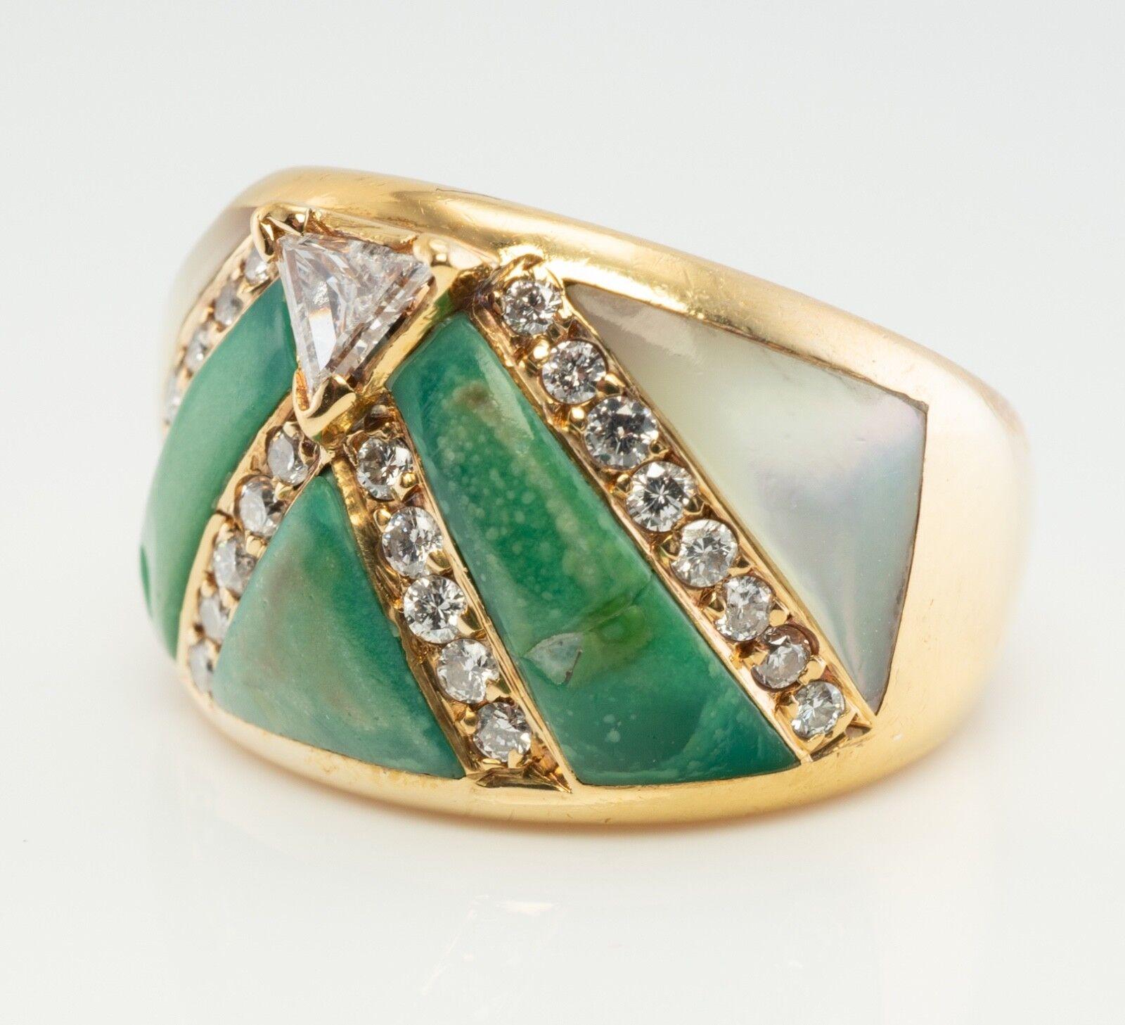 This beautiful estate ring is finely crafted in solid 18K Yellow Gold and set with genuine Turquoise, Mother of Pearl, and diamonds. The trillion cut diamond is .50 carat of VVS2 clarity and G color. Twenty-six round brilliant cut diamonds total .39