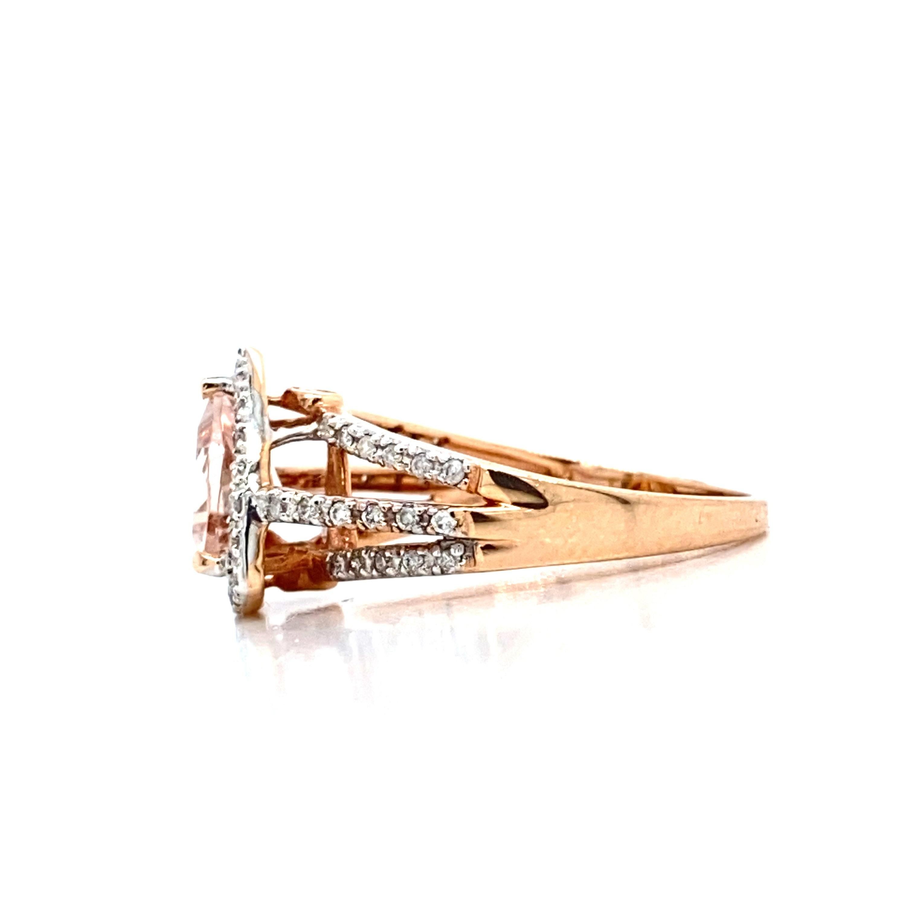 This is a gorgeous natural 1.38CT morganite and diamond halo vintage ring set in solid 14K rose gold. The natural 8MM trillion cut morganite has an excellent peachy pink color (AAA quality gem) and is surrounded by a halo of round cut white