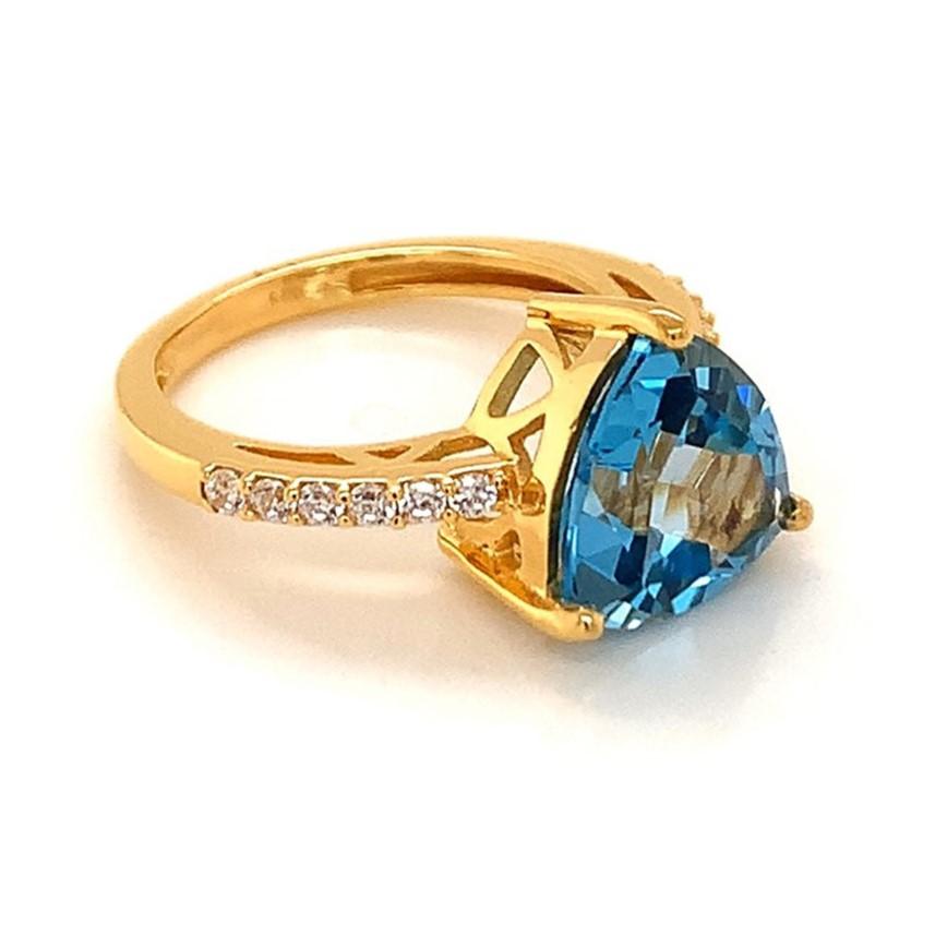 Trillion Shape Swiss Blue Topaz Gemstone And CZ beautifully crafted  in a Ring. A fiery Blue color December Birthstone. For a special occasion like Engagement or Proposal or may be as a gift for a special person.

Primary Stone Size - 10x10 mm