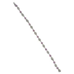 Trillion Pink Sapphire and Oval Motif Diamond Bracelet on 18 Karat White Gold