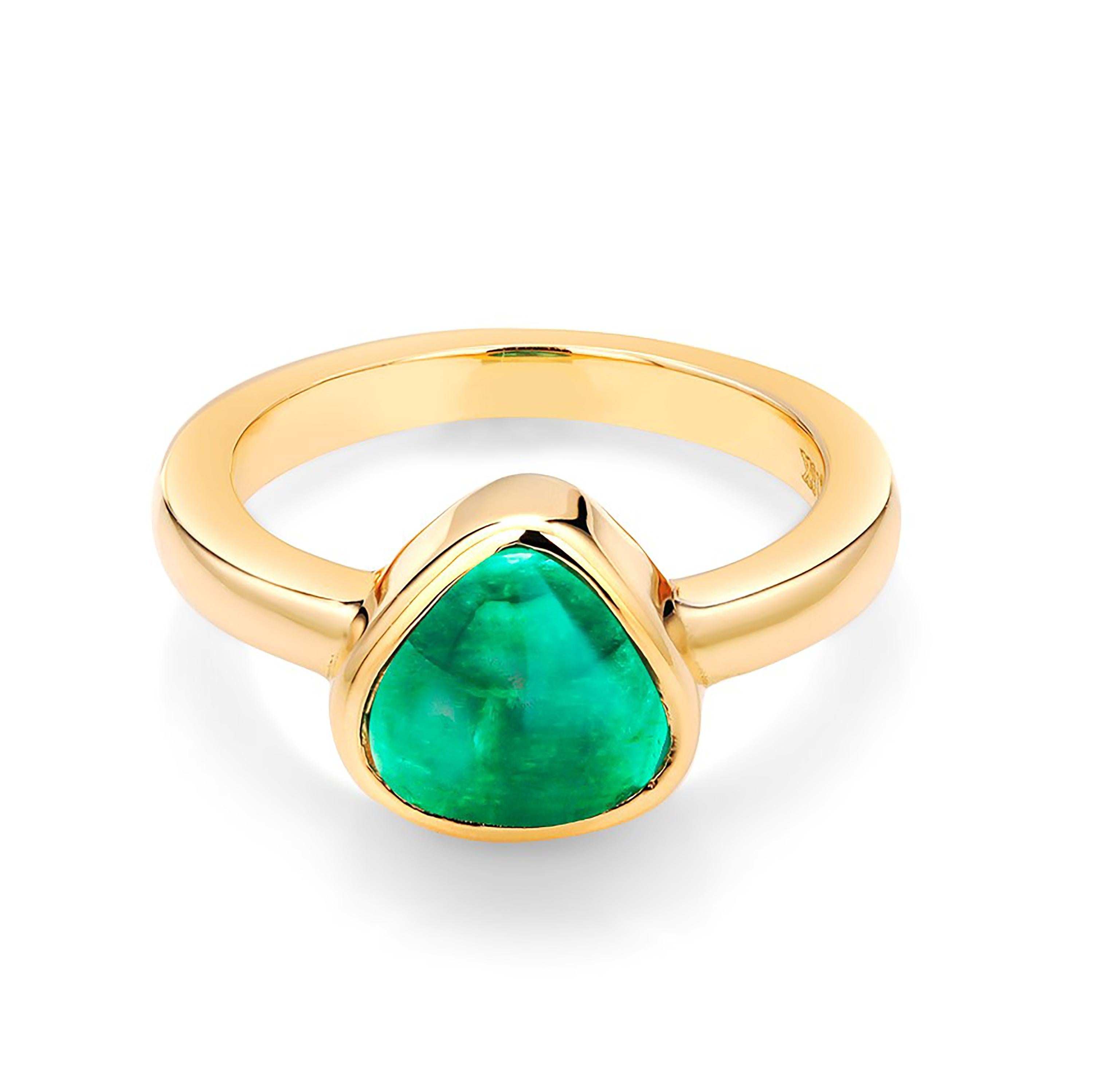 Eighteen karats yellow gold raised bezel dome cocktail ring
Trillion Colombia cabochon green emerald weighing 2.10 carats
Emerald hue color: grass green tone                                                               
Ring size 6 In Stock
The