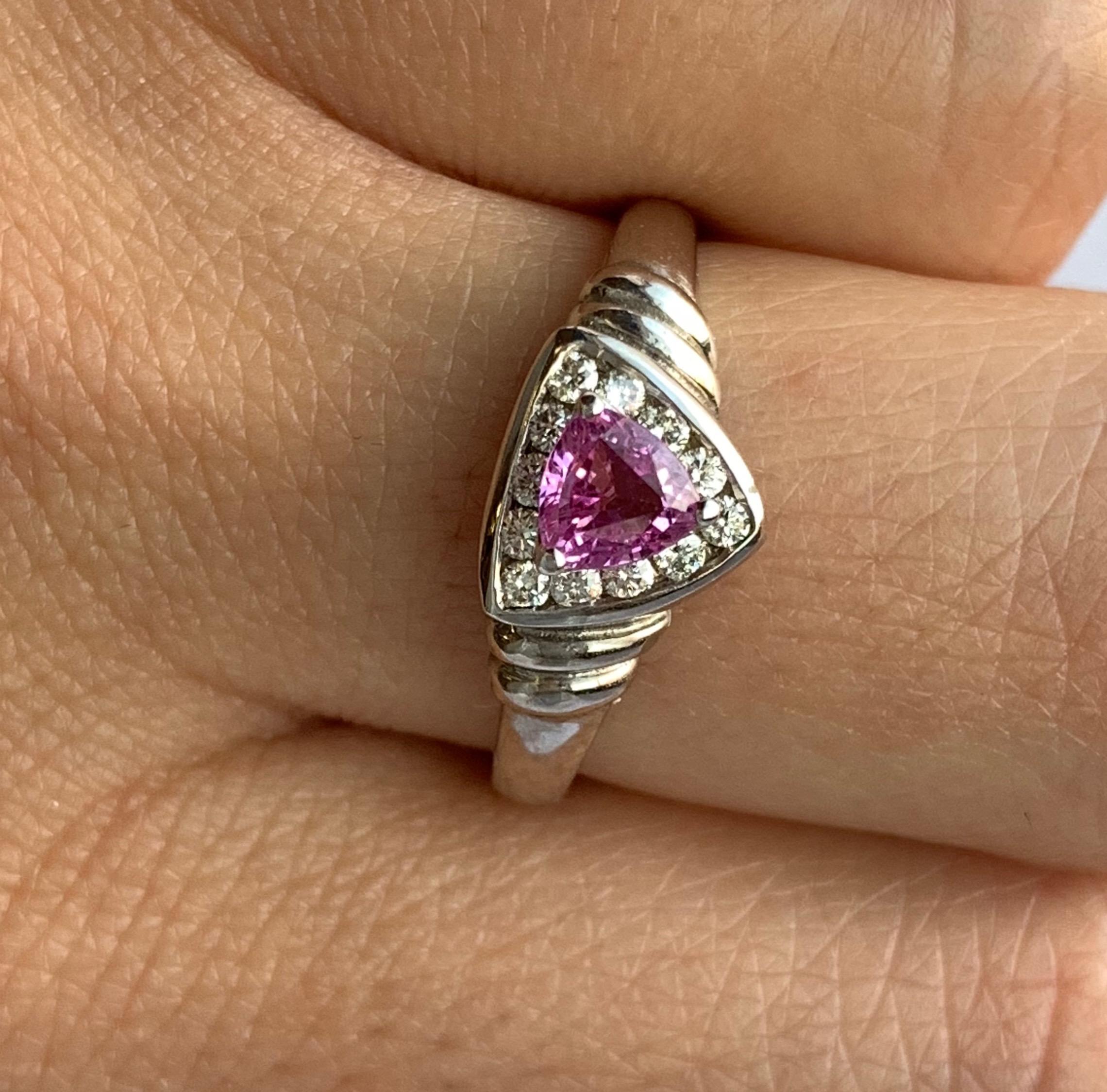 Contemporary Trillion Shaped Pink Sapphire and Diamond Ring