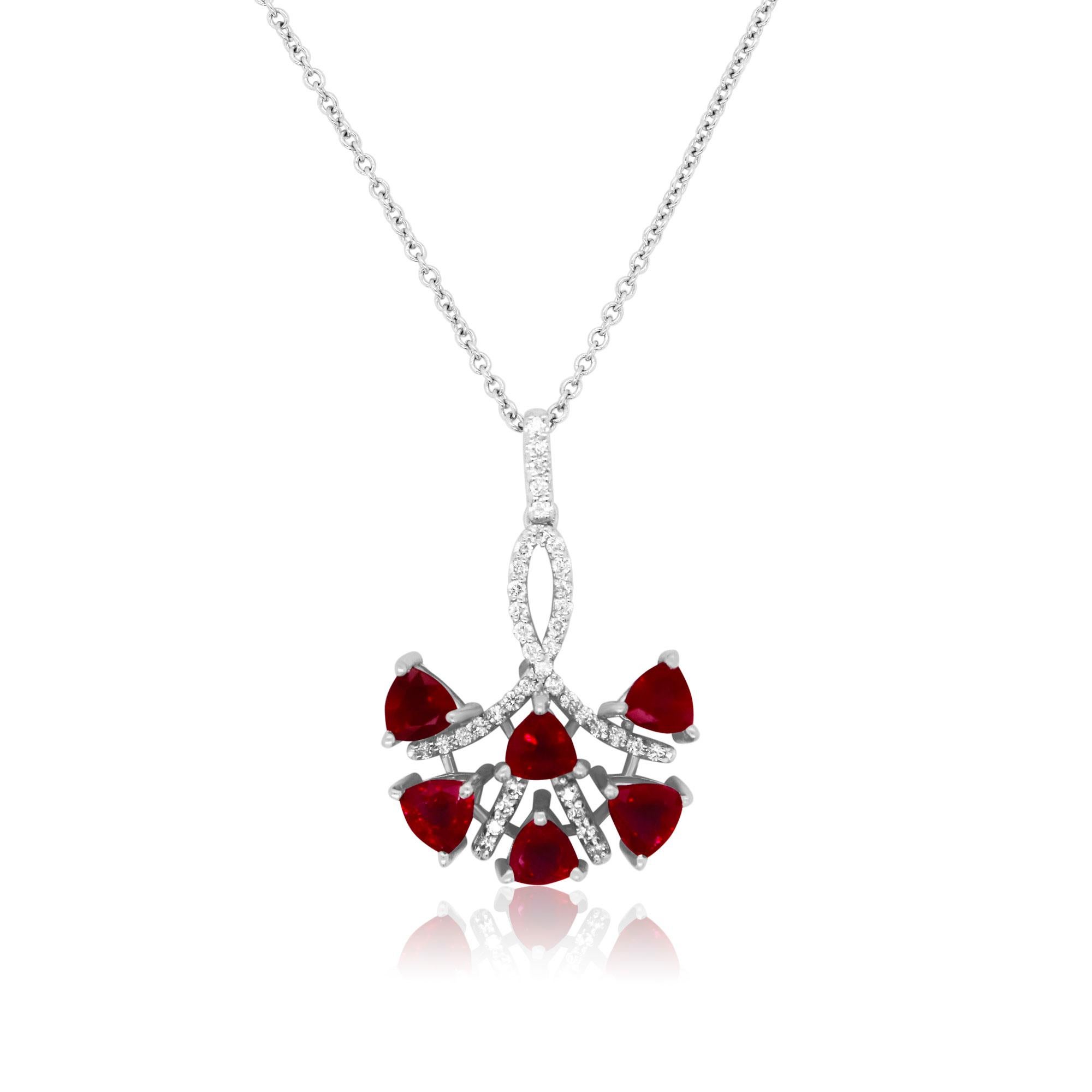 Material: 14k White Gold 
Center Stone Details: 6 Trillion Shaped Rubies at 2.35 Carats Total Weight- Measuring 4 x 4.5 mm
Diamond Details: 41 Brilliant White Diamonds at .20 Carats - Clarity: SI / Color: H-I

Fine one-of-a-kind craftsmanship meets