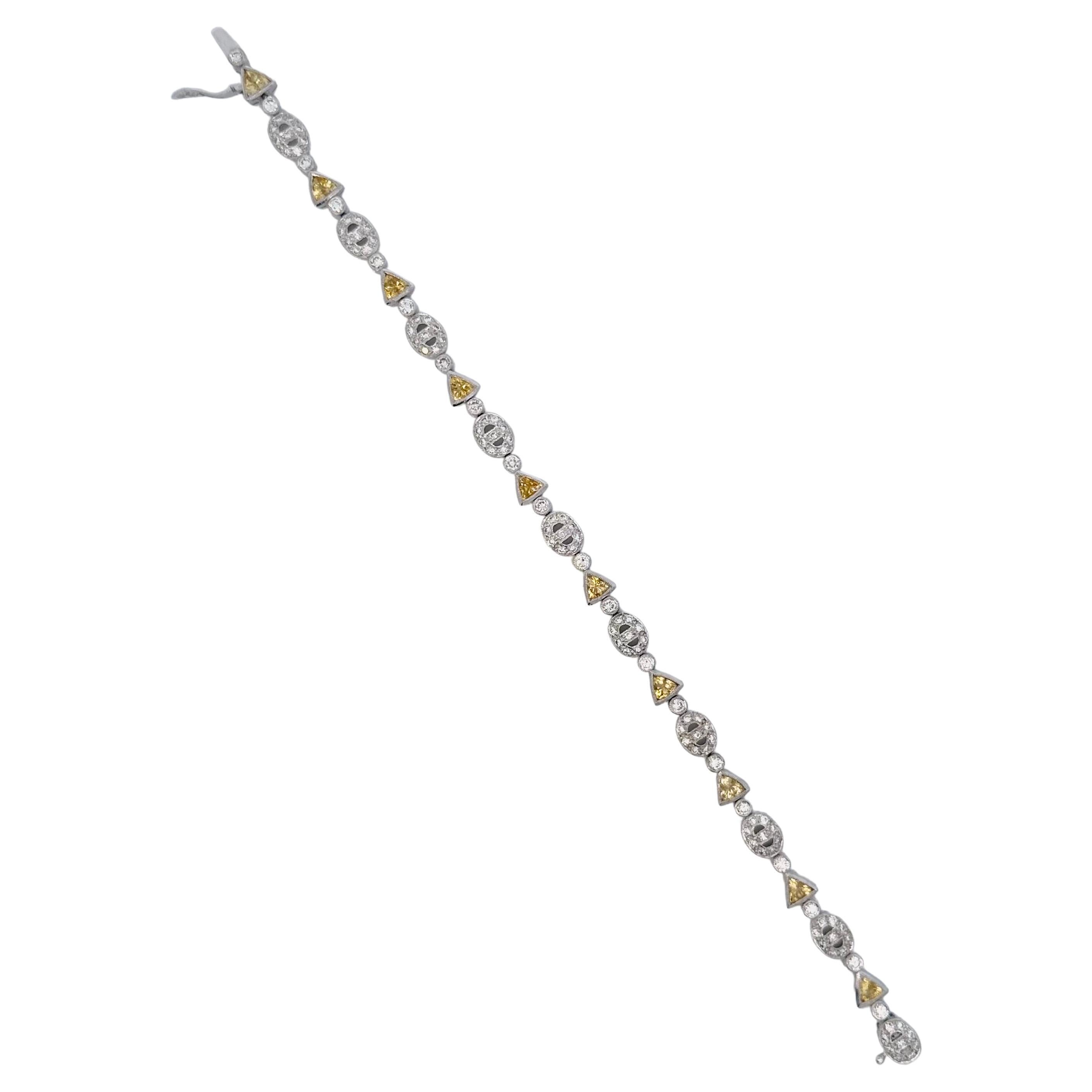 Trillion Yellow Sapphire and Oval Motif Diamond Bracelet on 18 Karat White Gold For Sale