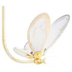 Lampe suspendue « Trilly » aux ailes en cristal argenté transparent, corps en laiton